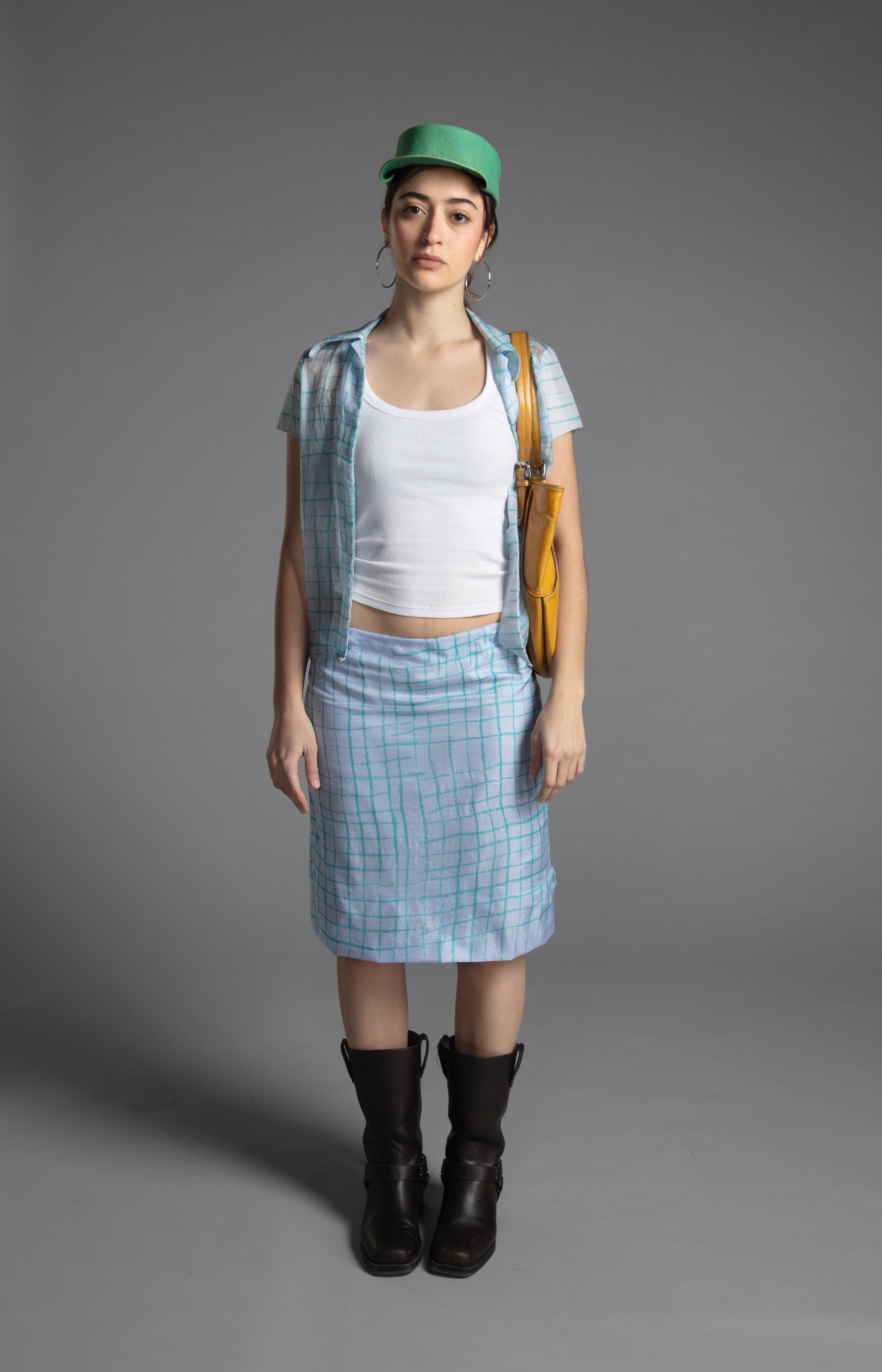 Hand printed silk skirt with cotton backing and matching collared shirt, hand-blocked wool hat with custom dye, 2026