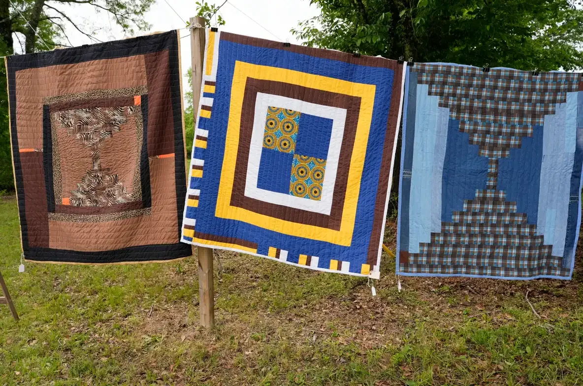 Gee's Bend Quilters show off their work in the spring yard show