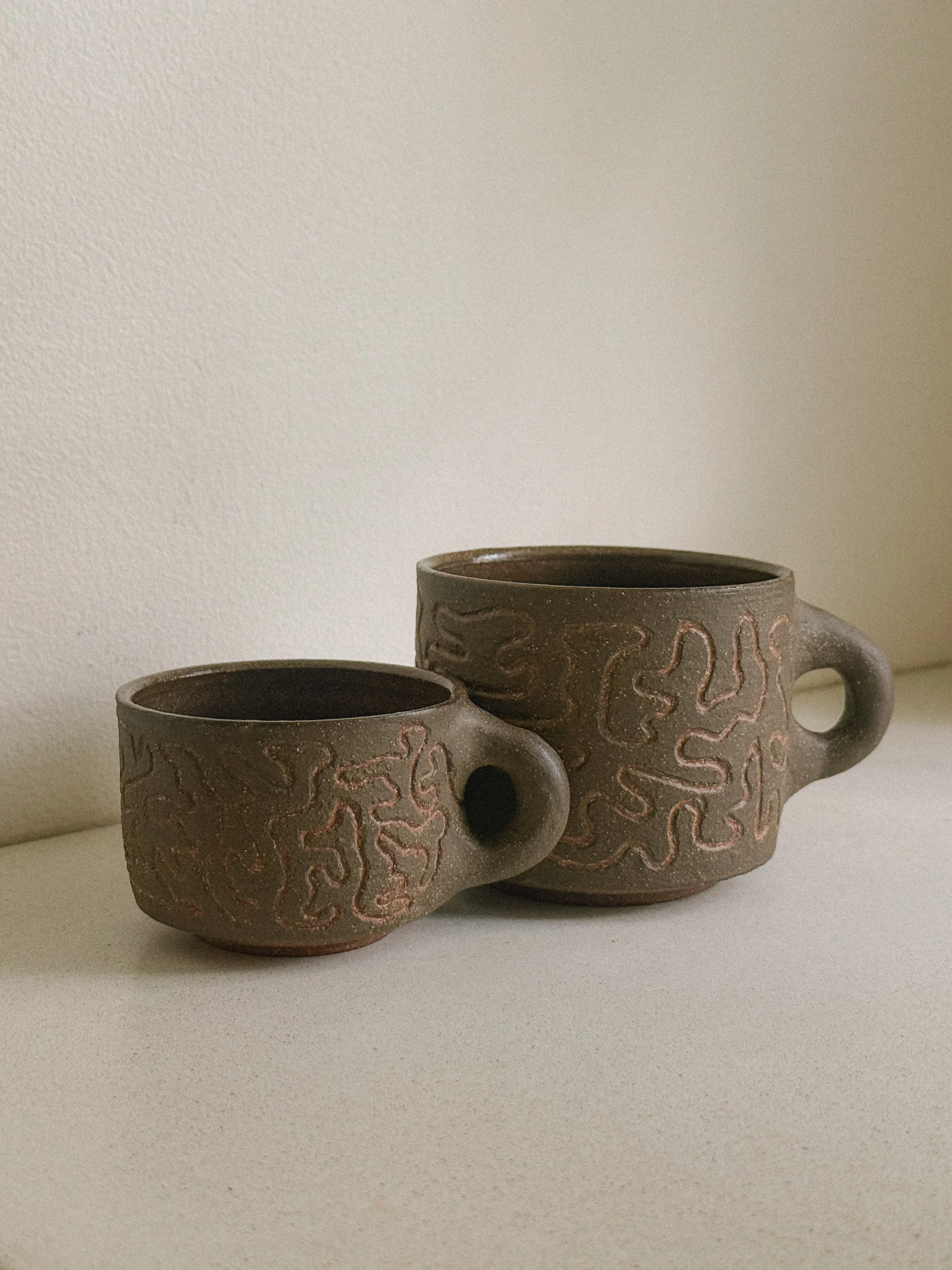 The worm's commute mug