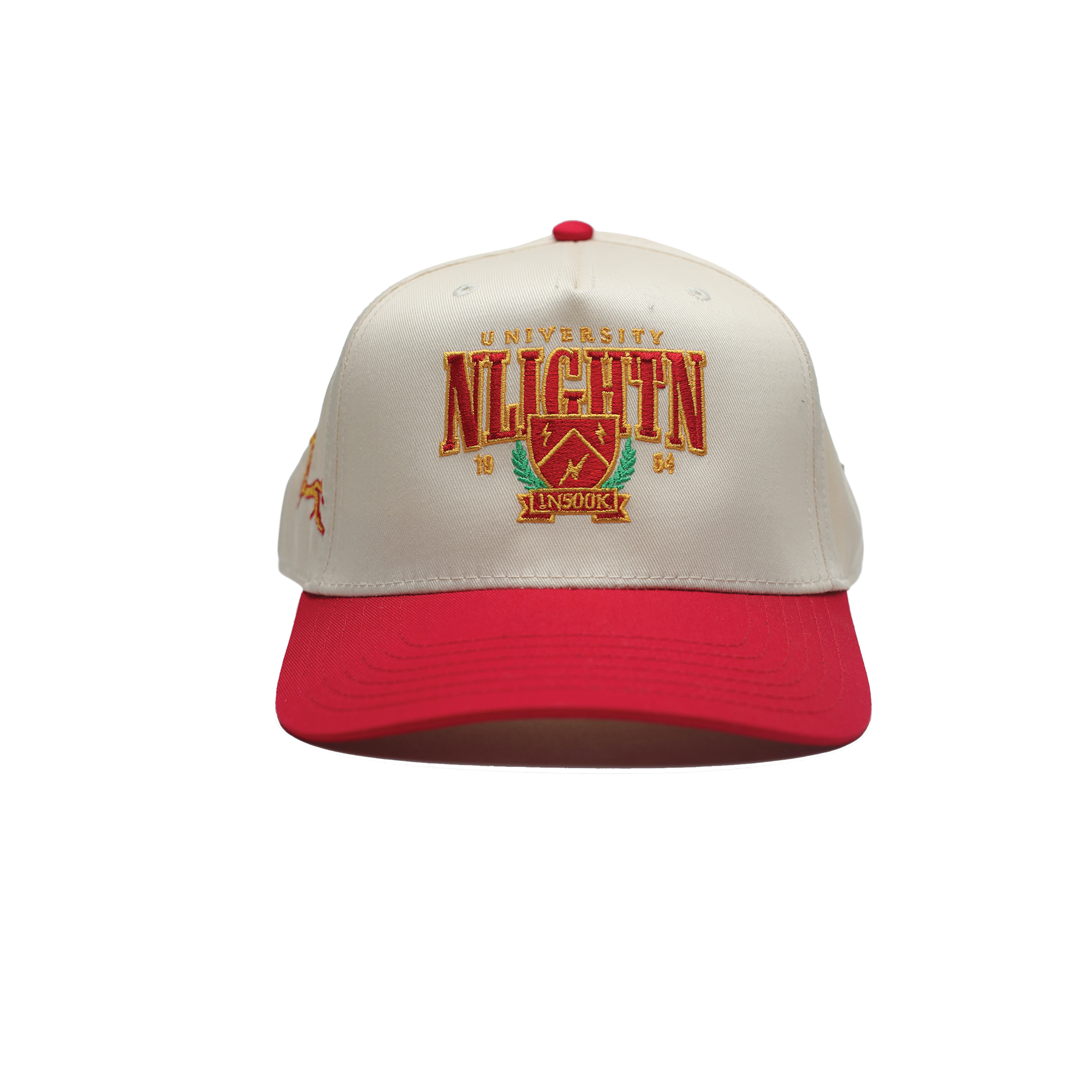 A white and red baseball cap with the University of Notre Dame emblem embroidered on the front