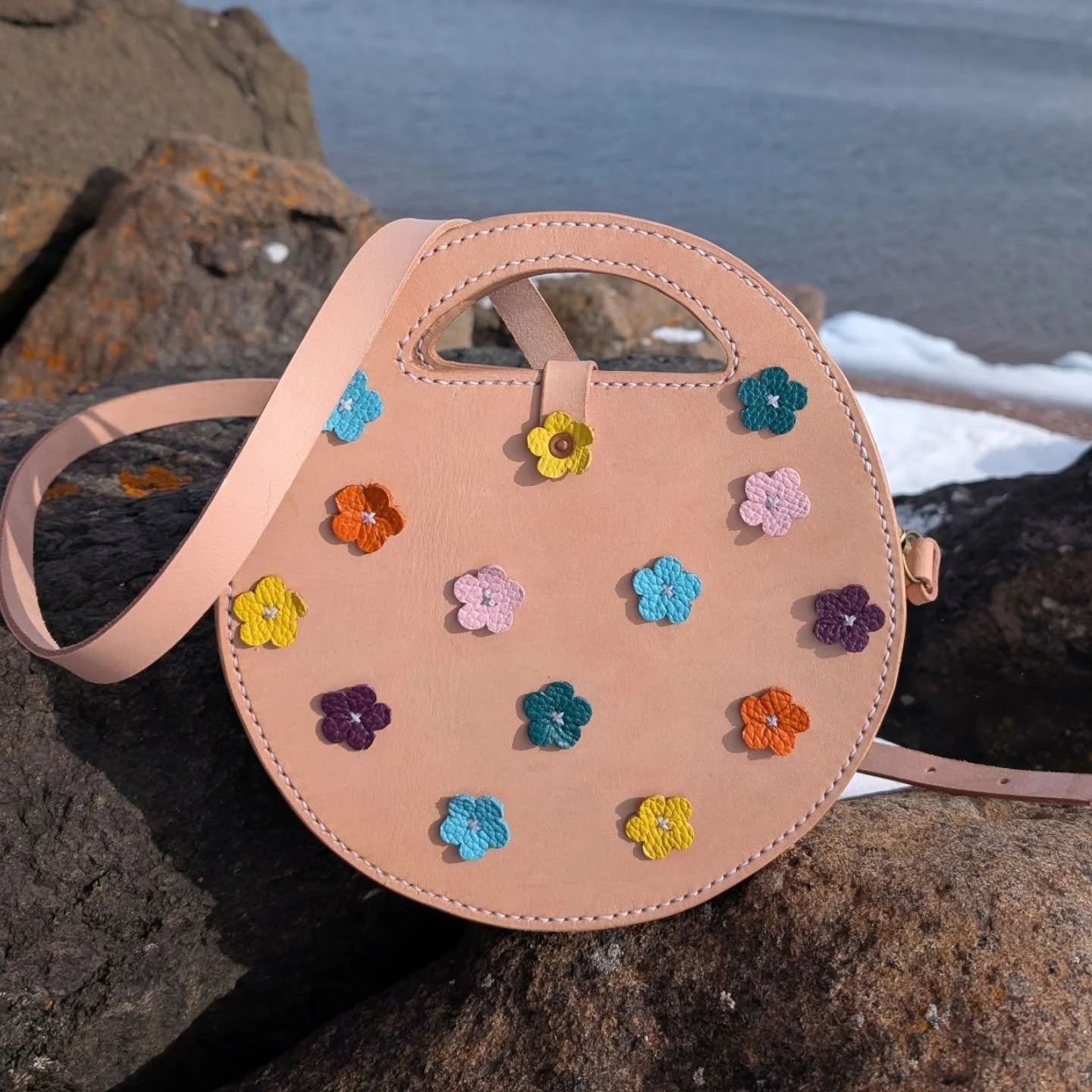 I think I'm calling this the flower field bag. I love this bag, and can't believe that I've only created one of them. That will definitely be changing in the near future! Using colorful scraps, the flowers make such a cute, fun, and feminine piece. 
