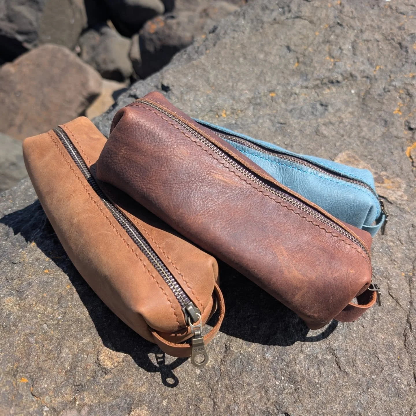Some simple zippered pouches! 
The smaller size is perfect for pencils or art supplies, and the larger is great for toiletries. It's been fun to experiment with different colors- but this will be some of the last of this blue color and I am definitel