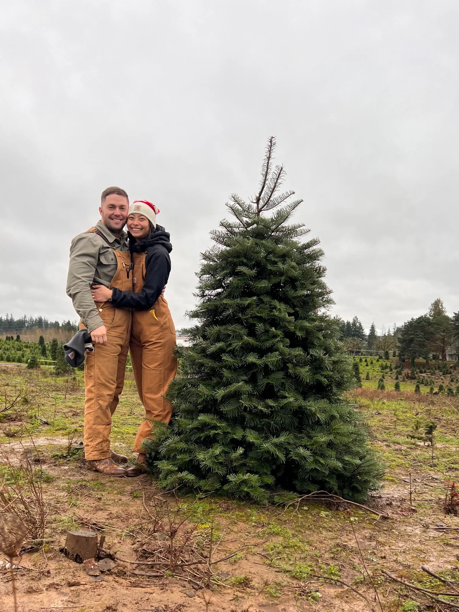 The Poff family together at a Christmas tree farm