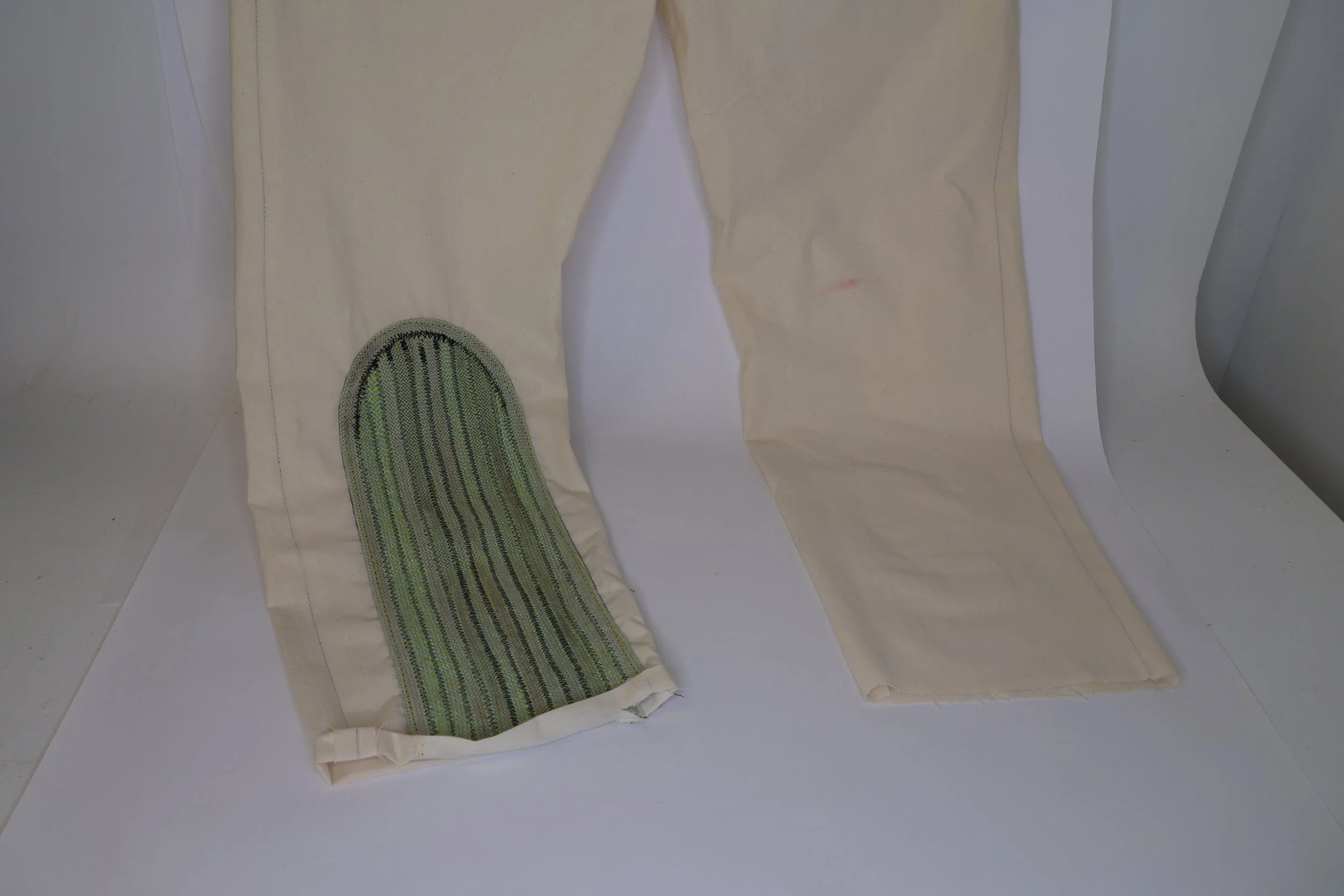 First iteration of climbing rope knee pads. The length at the bottom made the jumpsuit hard to move in.