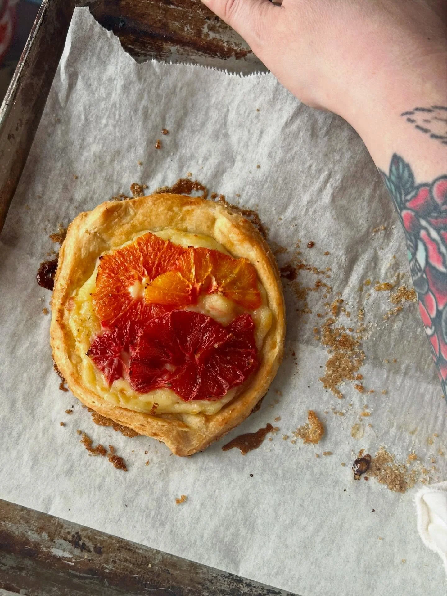 Ooh we&rsquo;re so back this week and bringing some exciting new menu items with us! Here&rsquo;s a sneak peek at our orange fennel + pastry cream galette we&rsquo;ve been working on &mdash; bright, creamy, perfectly balanced, and baked in a buttery,