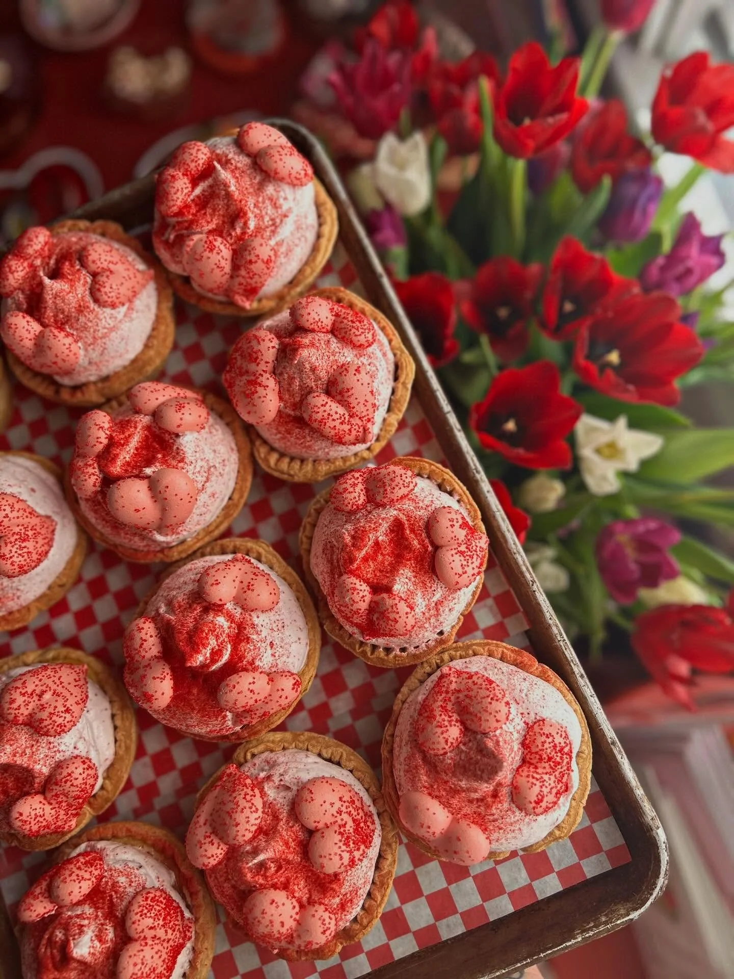 We&rsquo;ve had our heads buried in butter and flour but I wanted to pop on here and tell you that we&rsquo;ll have lots of Valentine&rsquo;s Day specials available at the shop tomorrow! Pictured here are two different tarts, a lemon strawberry merin