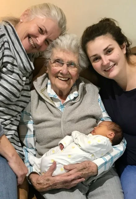Image of Annie Barber, her mother, daughter and grandaughter a few days after baby's birth.  4 Generations of my family - and 3 generations of mothers.