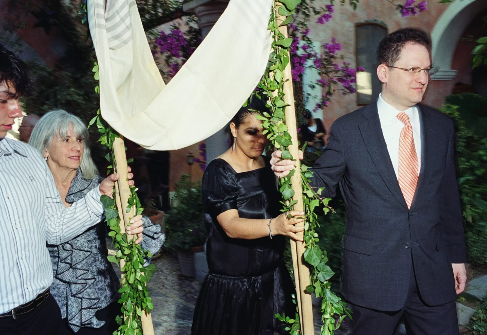 Walking the chuppah down the aisle. Shot on location in Mexico.