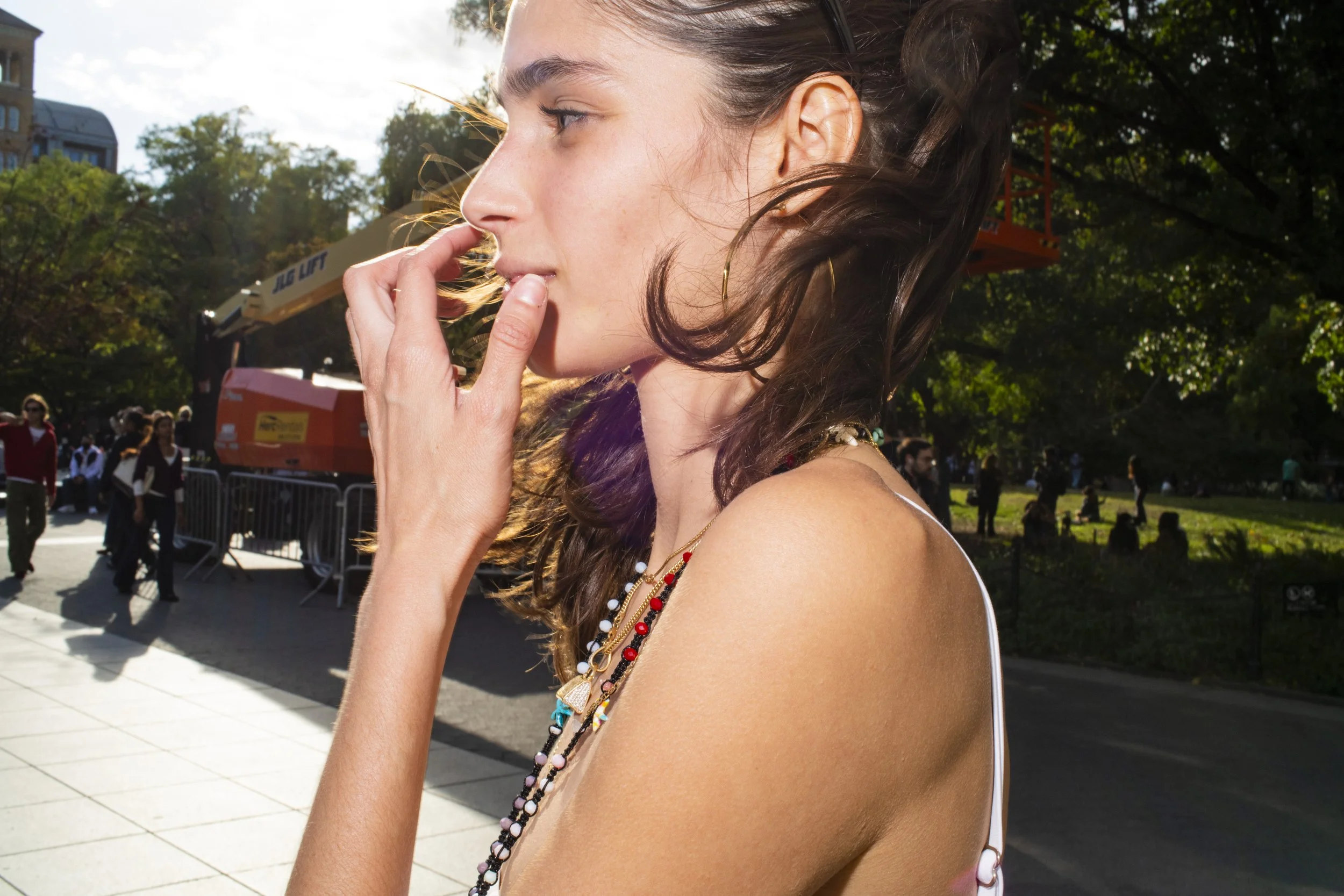 Profile of a woman with pony tail blowing in the wind