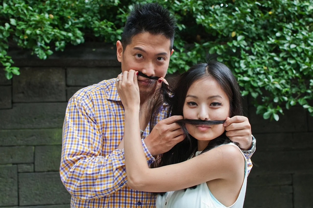 Couple enjoy a funny moment in Central Park