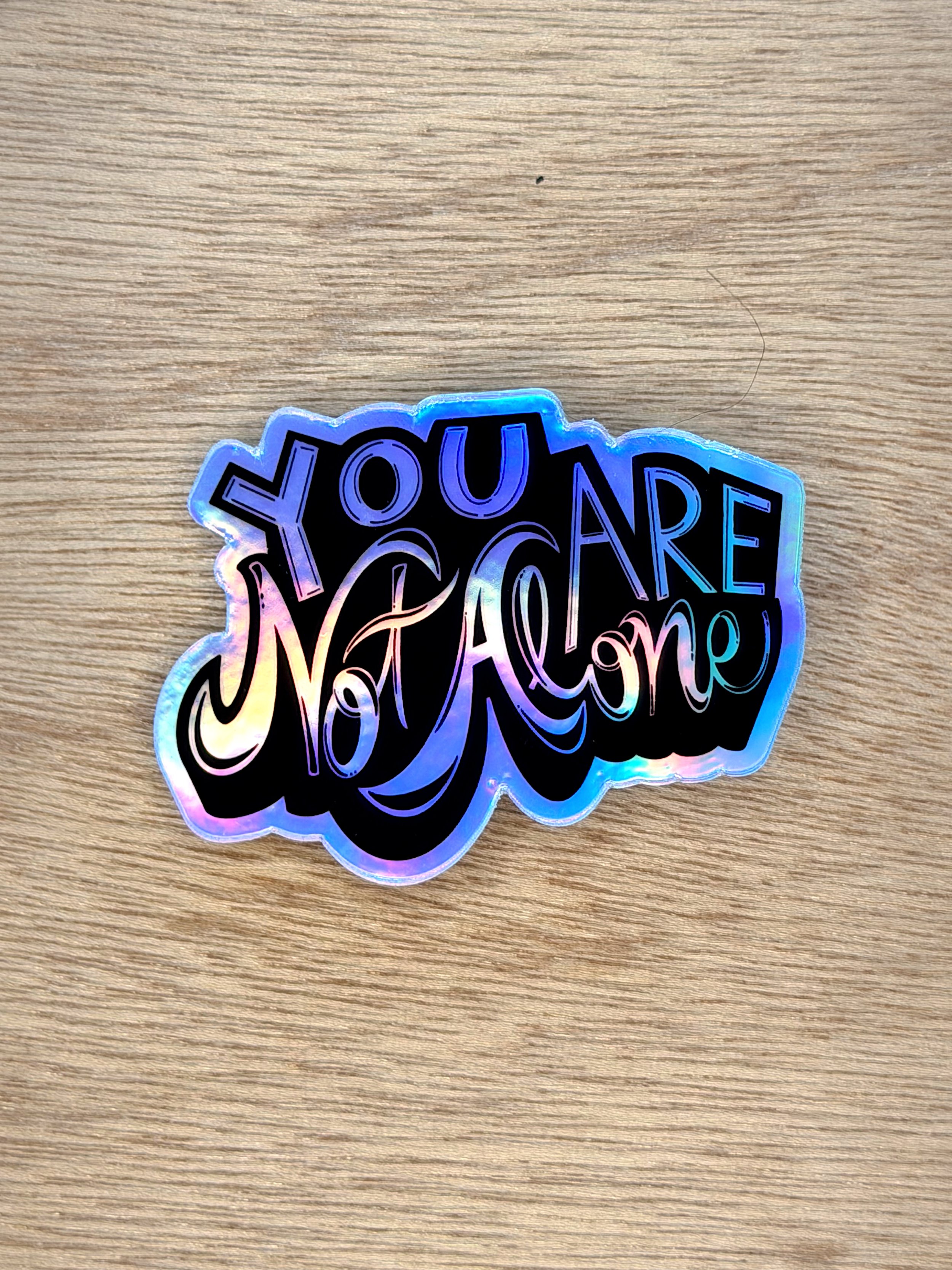 Not Alone Sticker