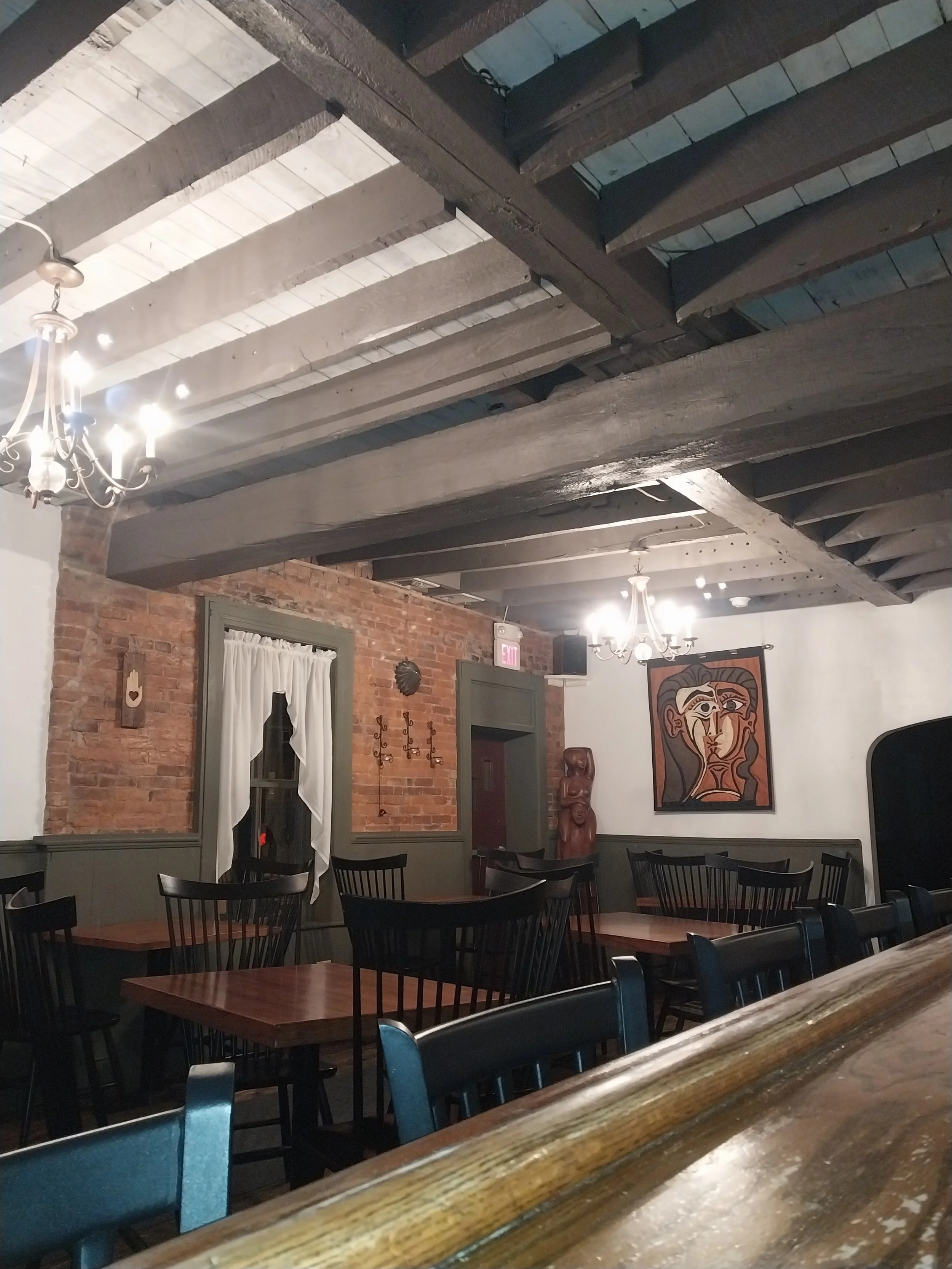 Freshly painted wood supports on the ceiling. 