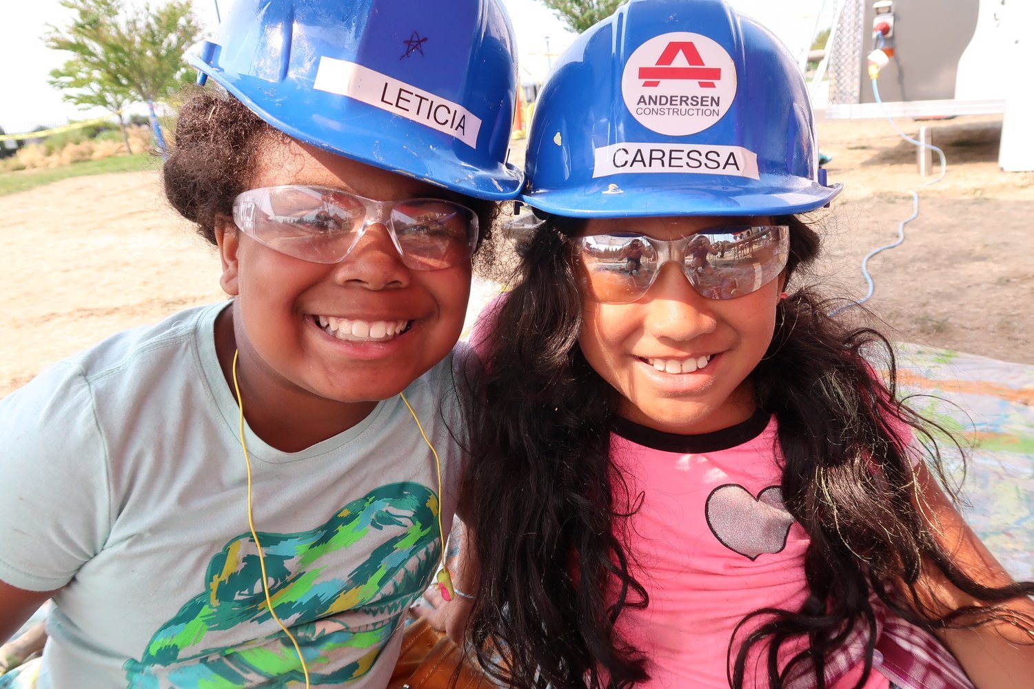 Girls build summer camp