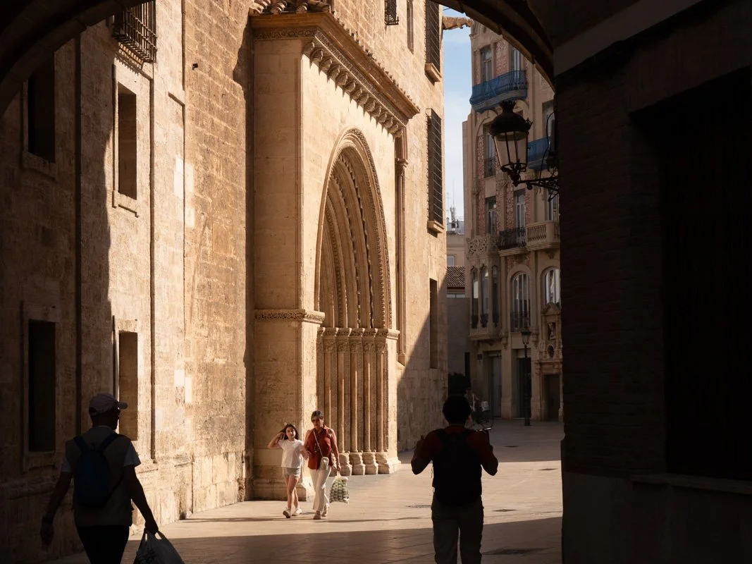 A shady archway outside Valencia cathedral
