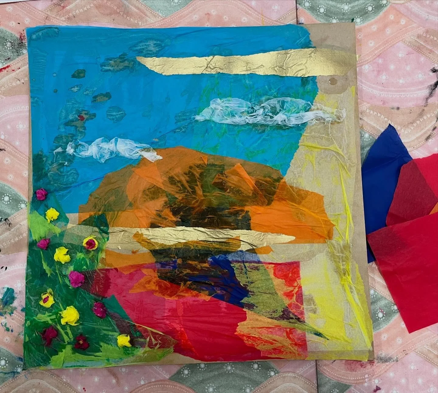 Tissue paper collage alongside residents at a temporary accommodation refuge. Mindfully drawing themes and visual elements from different artworks in the circle to create this image ❤️🌊☁️🌼