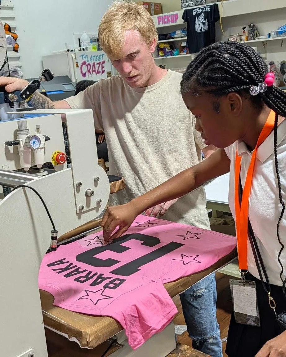 T-Shirt Takeover Recap

Our first Pod (class) with Latest Craze was a hit! Emerging creatives brought in their own designs, learned how to turn them into digital artwork, and then transferred them onto t-shirts. We loved watching them grow in confide