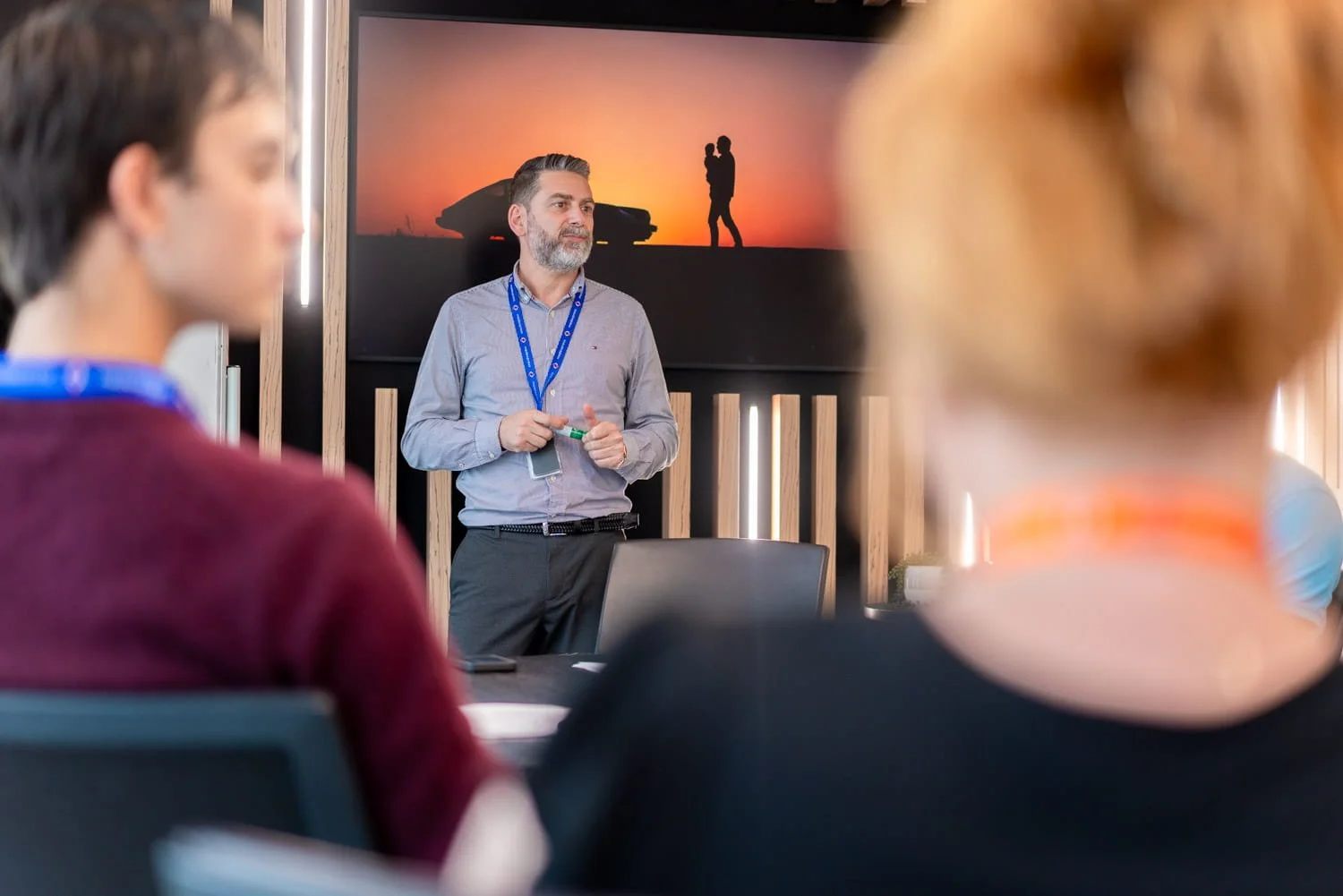 A commercial image taken of a group of people in a conference room in Brisbane by Tom MacDonald