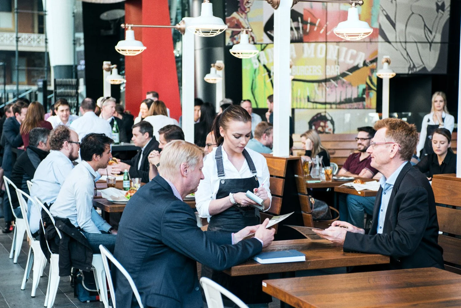 A commercial image of a busy Brisbane restaurant taken by Commercial food photographer Tom MacDonald of Tom Mac photography.