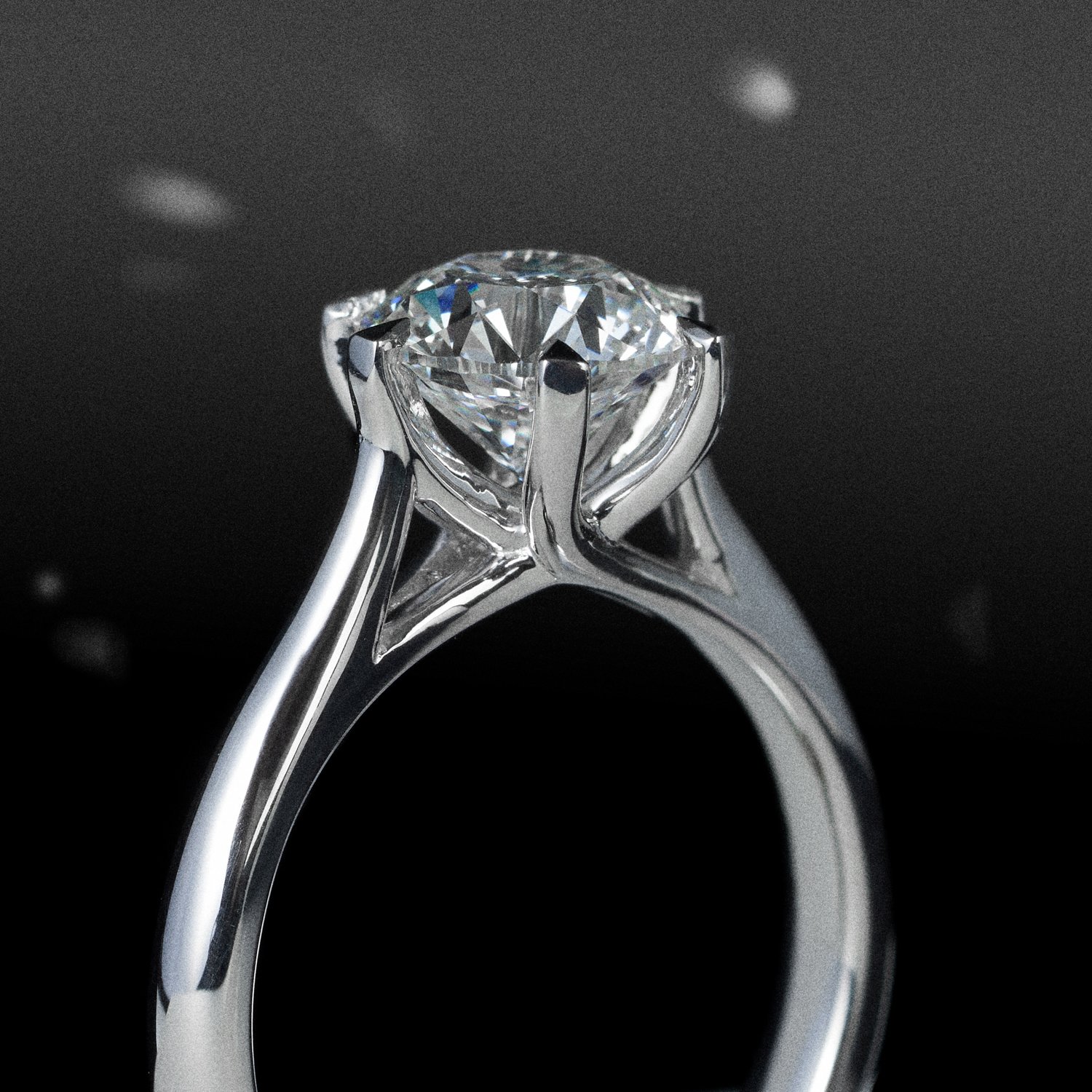 A  commercial jewellery photograph close-up view of a diamond engagement ring taken by Brisbane based commercial photographer Tom MacDonald for Hardy brothers jewellers.