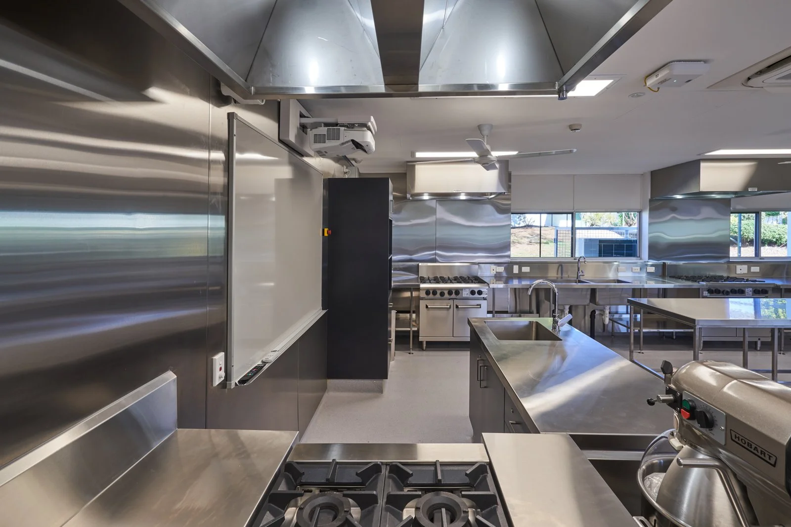 A commercial image of a commercial kitchen taken to show the quality of work by the design and building team. Taken By photographer  Tom MacDonald in Ipswich Queensland