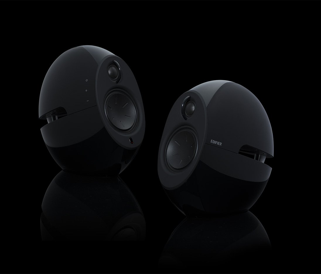 A commercial product photograph of black speakers on a dark background. Taken by  Brisbane photographer Tom MacDonald