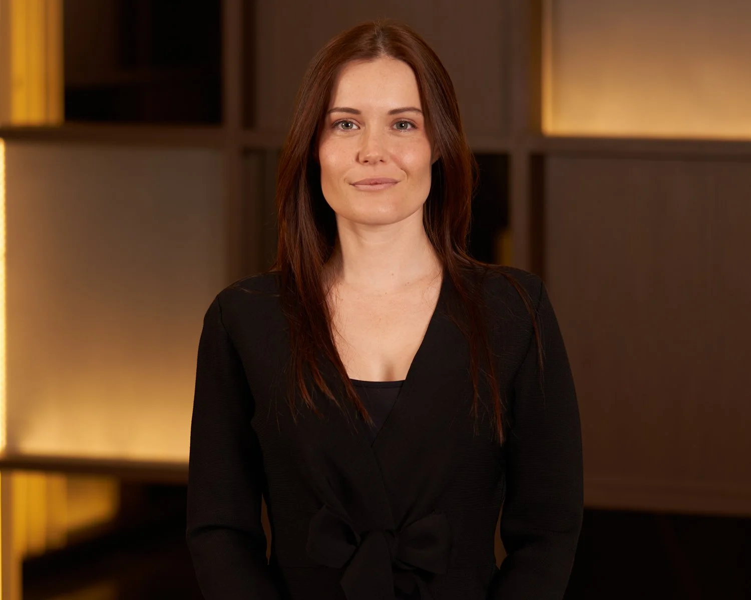 A commercial headshot of a female worker in a lawfirm in Brisbane taken by Tom MacDonald of TomMac photography