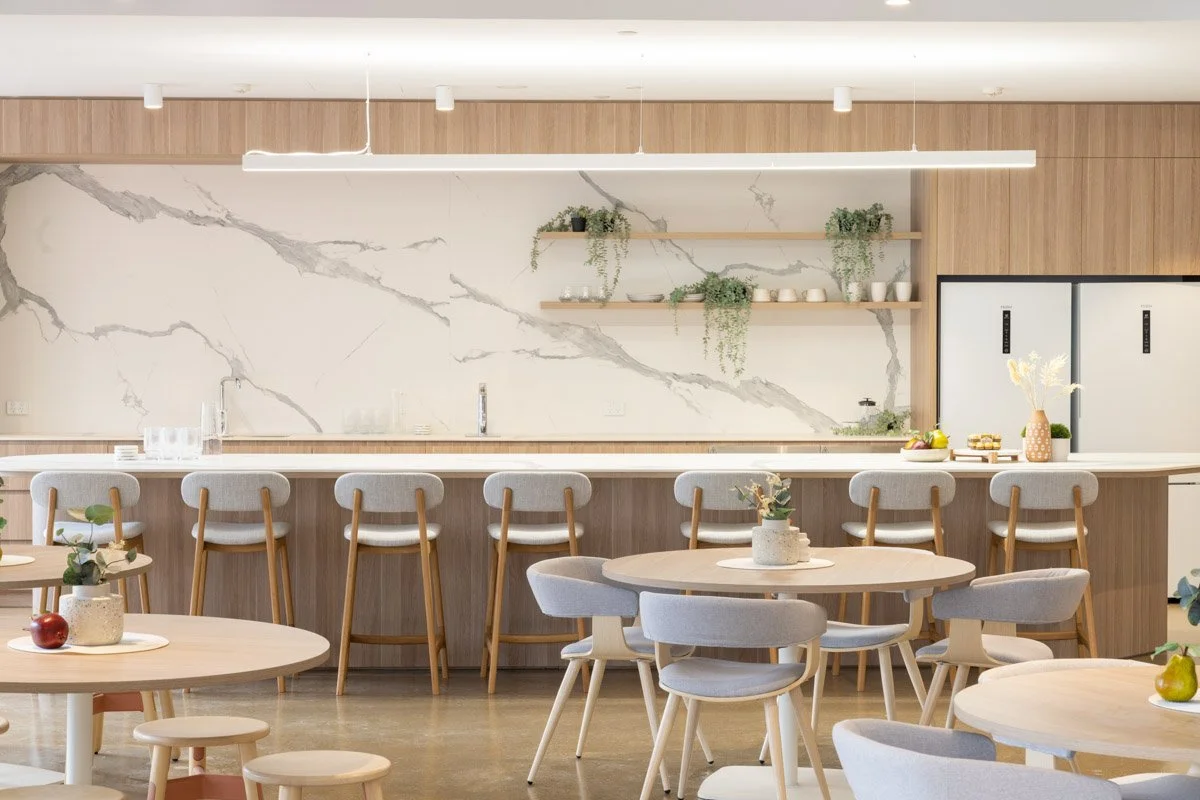 A commercial photograph of a Modern kitchen and dining area in a Brisbane office taken by Tom MacDonald