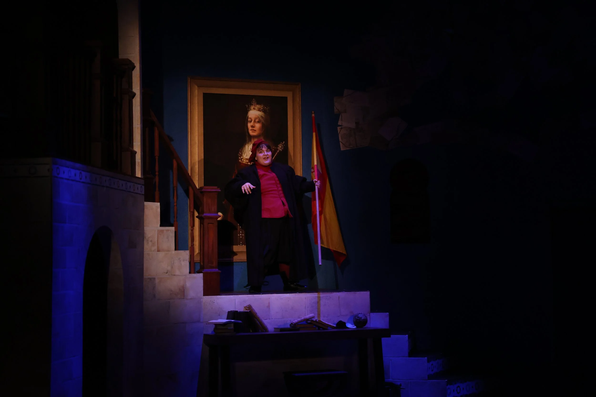 Christopher Columbus addresses the audience at night