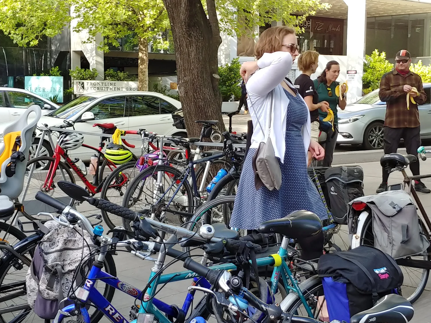 People and parked bicycles gathering at a Canberra Ride2Work event