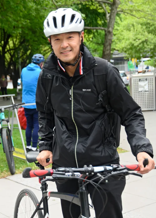 A rider smiling with their bike at National Ride2Work Day 2026 in Canberra