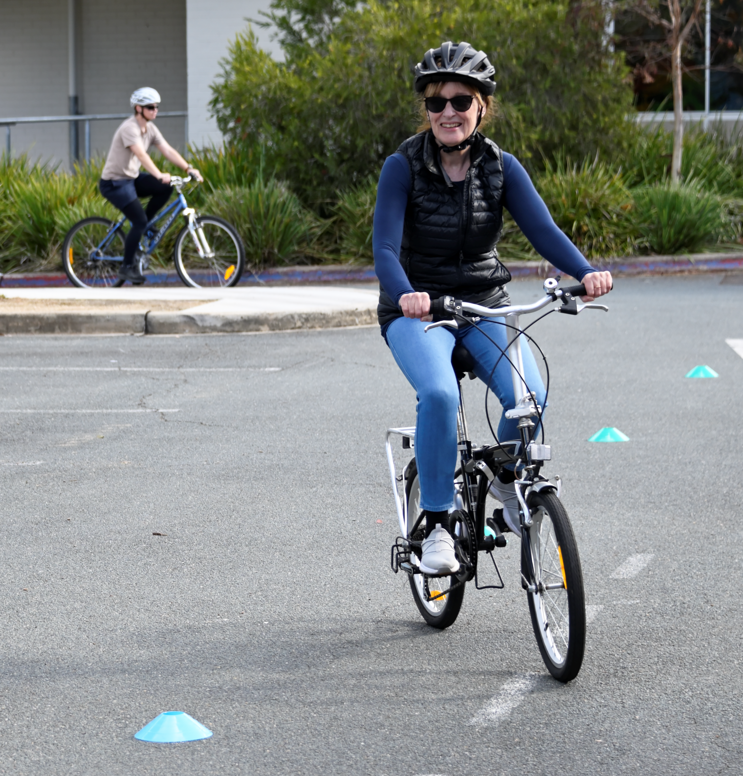 An adult learning to ride through a Pedal Power program