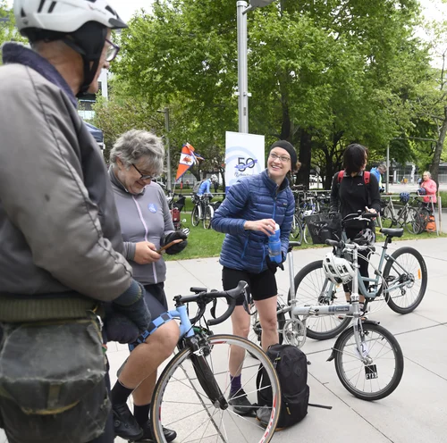 Attendees chatting with their bicycles at Veterans Park