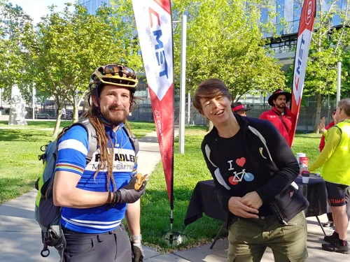 Two people smiling at a Canberra Ride2Work event