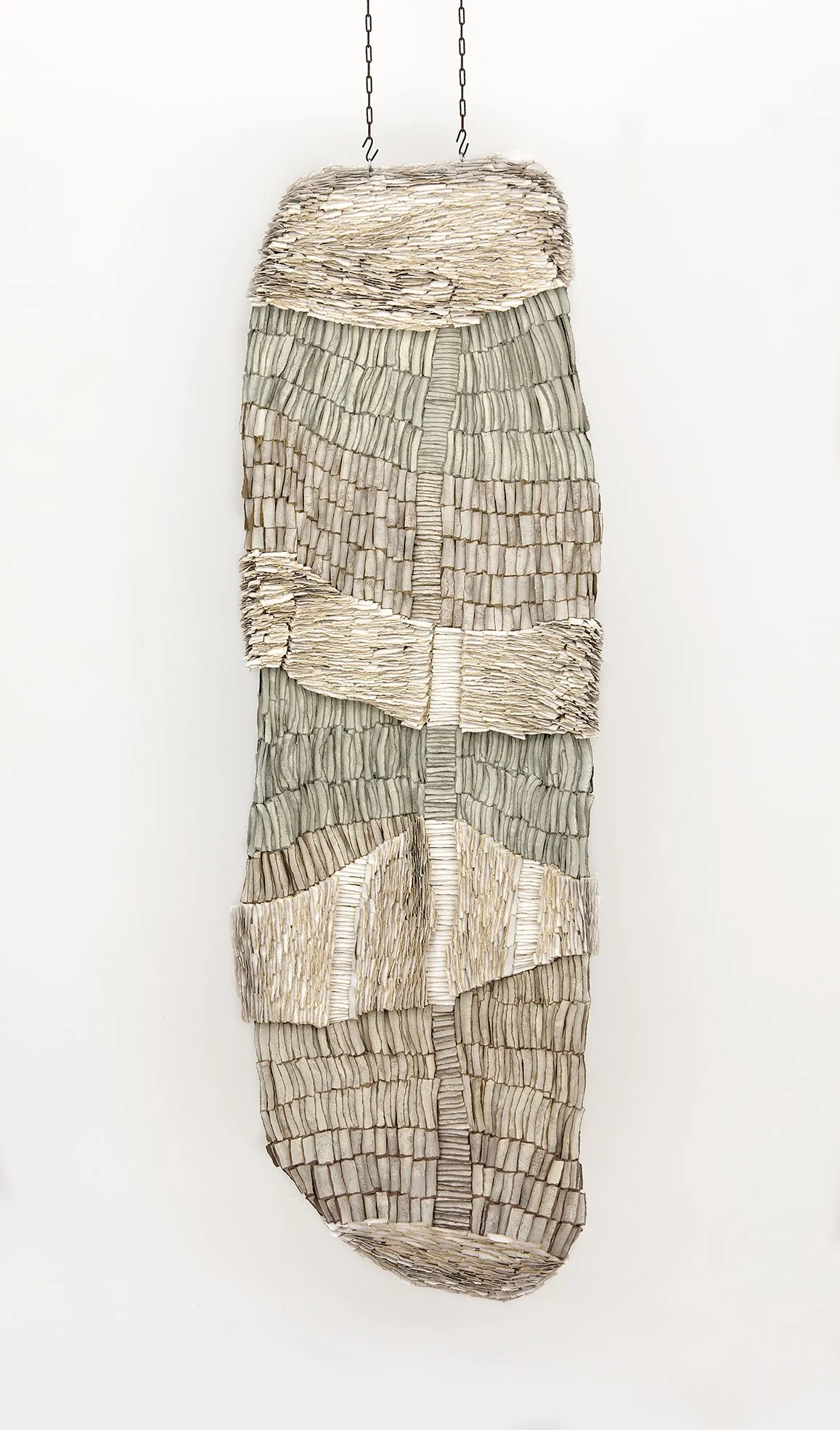 Co-existence, 2025, Carton, hand-torn paper, acrylic ,glue, H186 x W66 x D22cm photo by Sigal Kolton