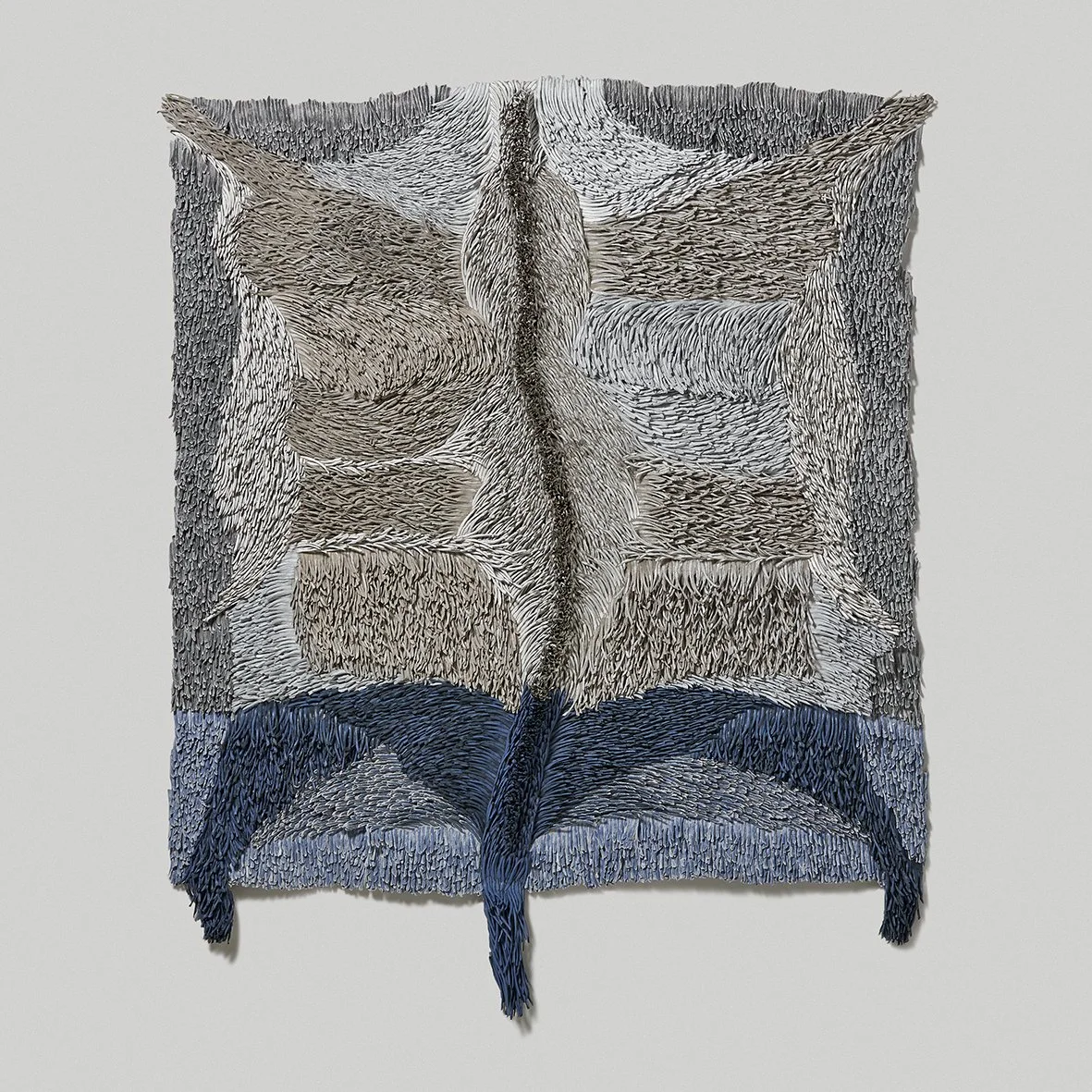 Protective Blanket Hide 2019, H200 x W145 X D10cm Textile, Hand-torn paper, acrylic paint, glue, photo by Sigal Kolton
