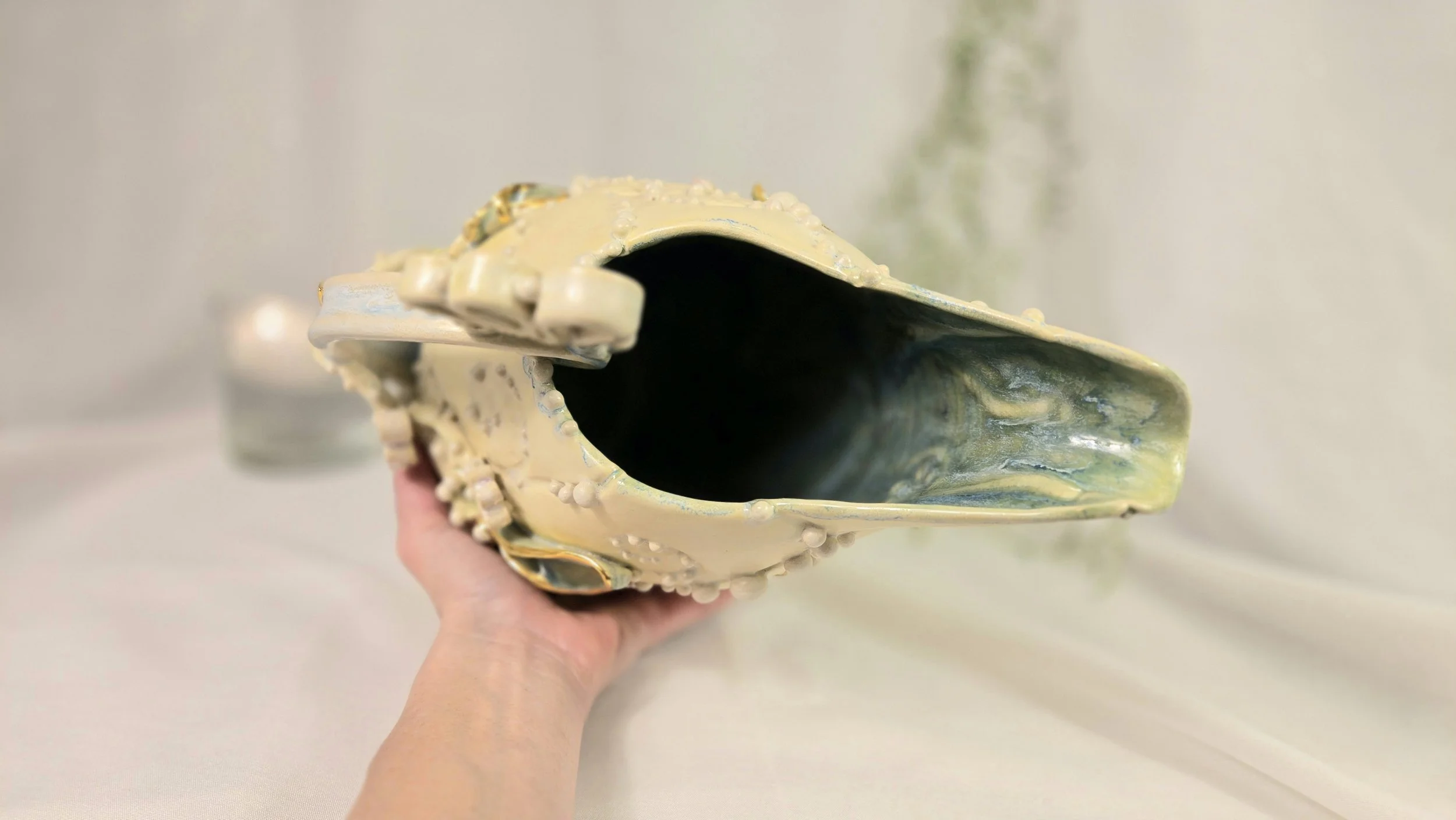 Tera Pitcher - alabaster, turquoise, hints of pinks, blues, greens, and pearl, with 22k yellow gold accents on white stoneware (6).jpg