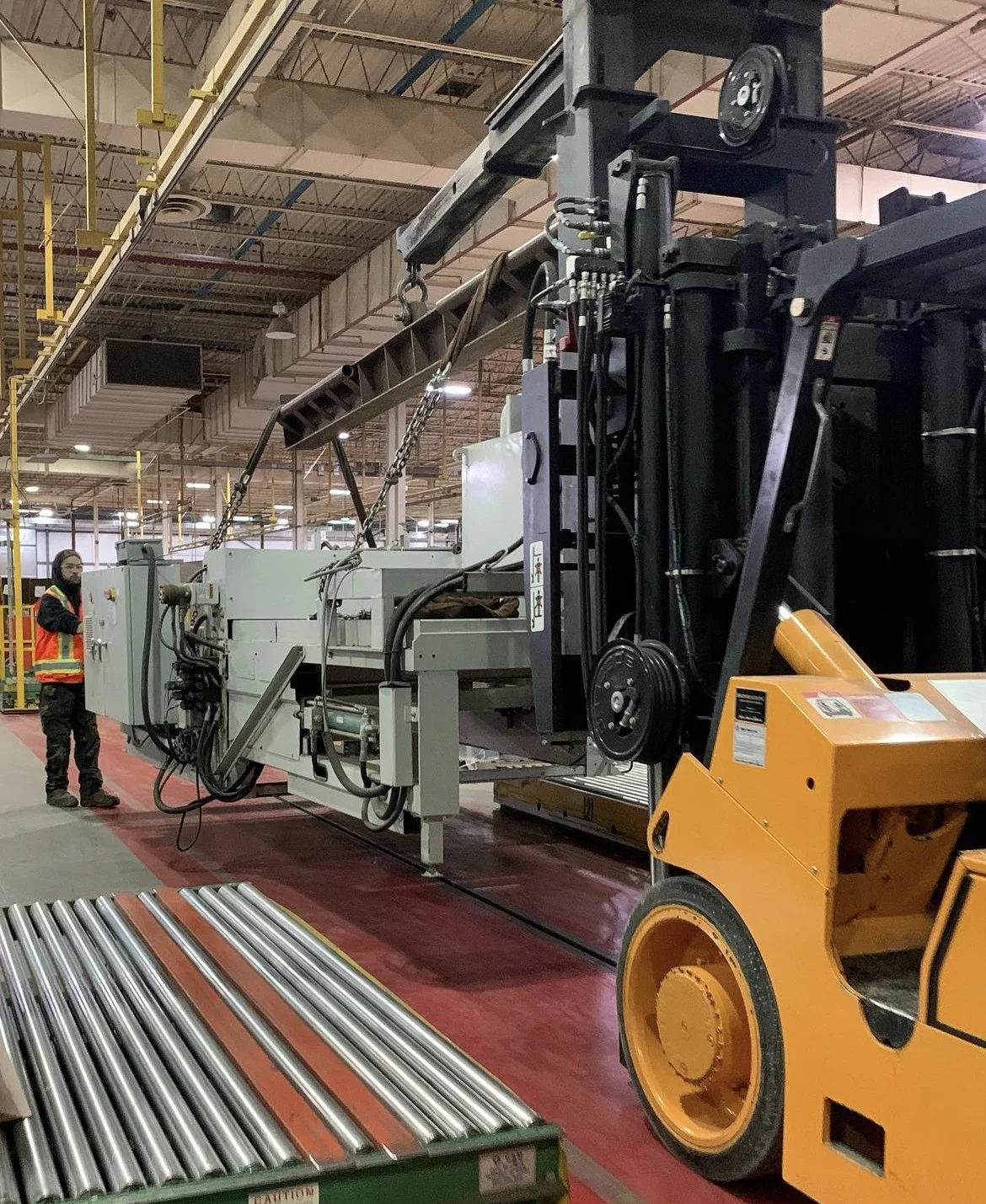 Machine Moving and rigging in industrial setting.