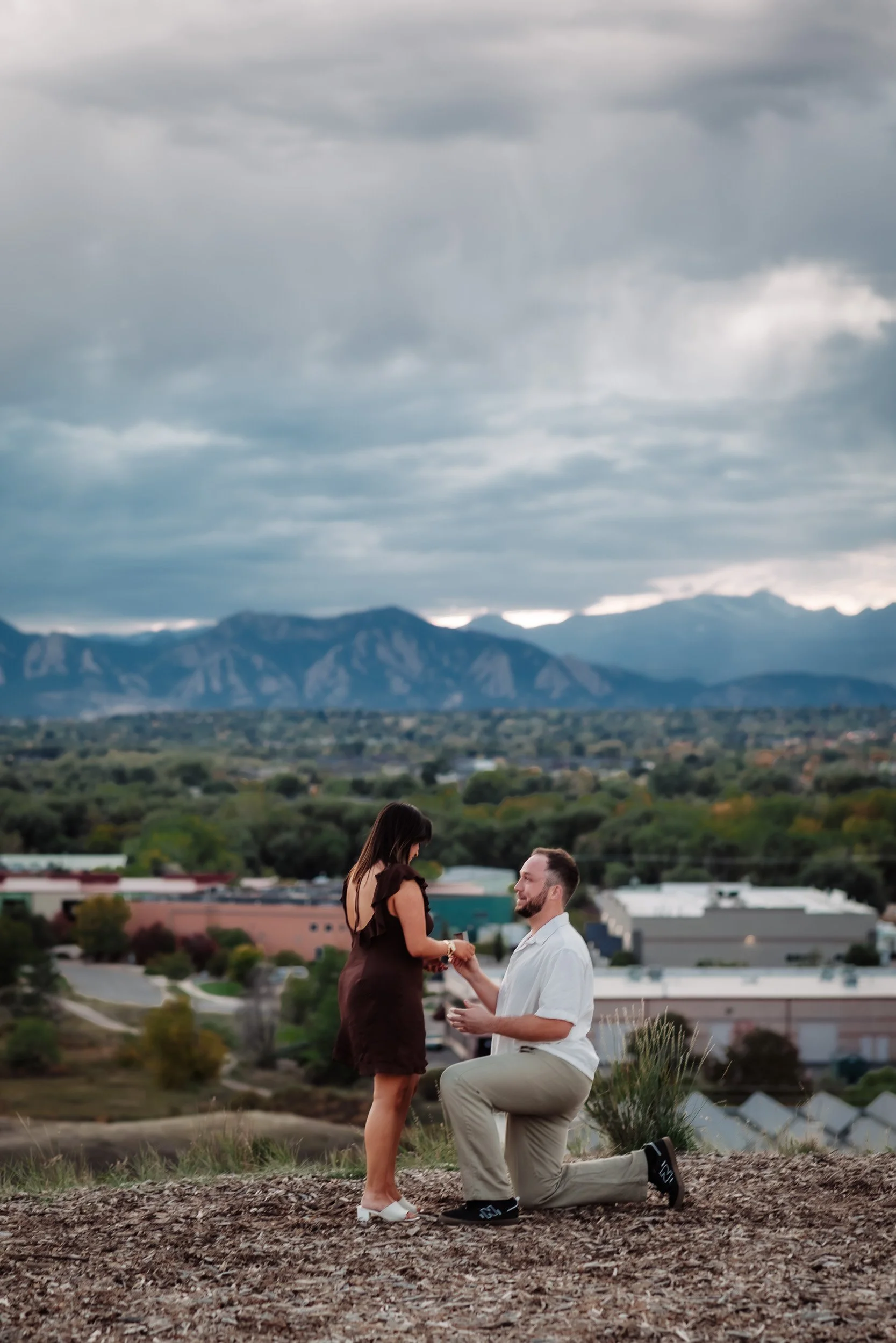 Surprise proposal at Acreage Brewery overlooking Boulder and the Flatirons
