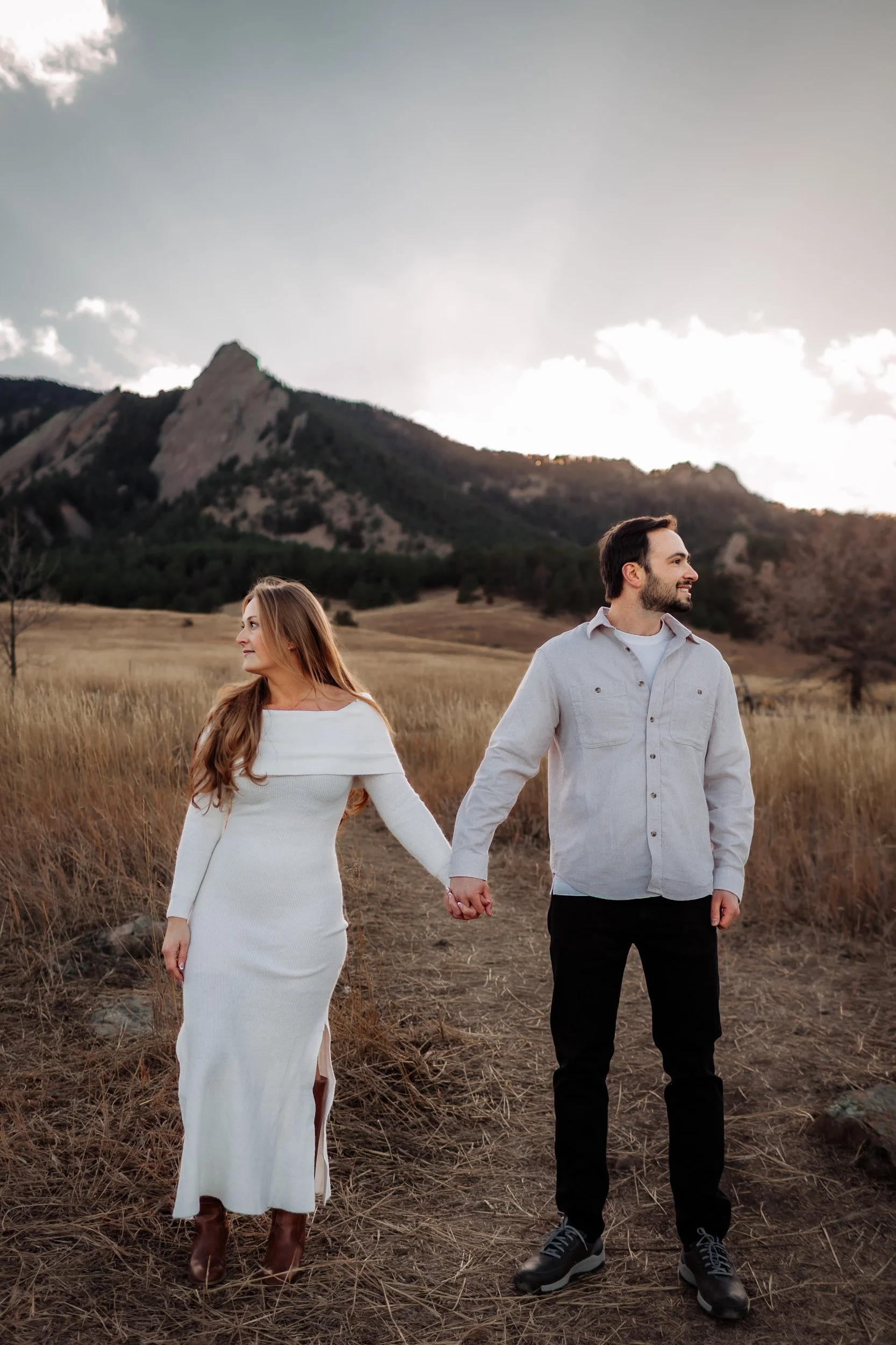 Engagement session with mountain views on an accessible walking path in Boulder, CO