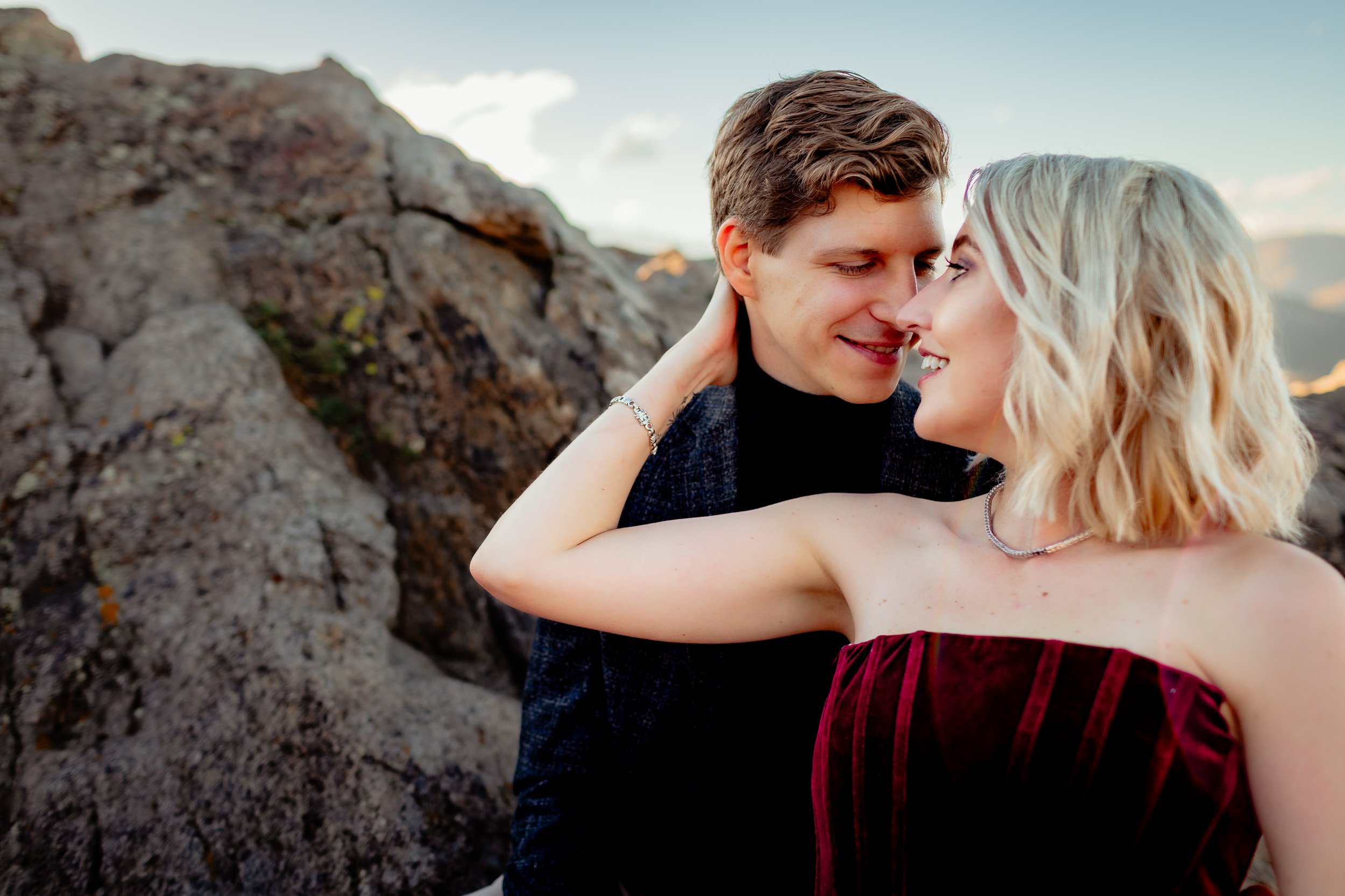 Engaged couple at Lost Gulch Overlook during golden hour in Boulder, Colorado