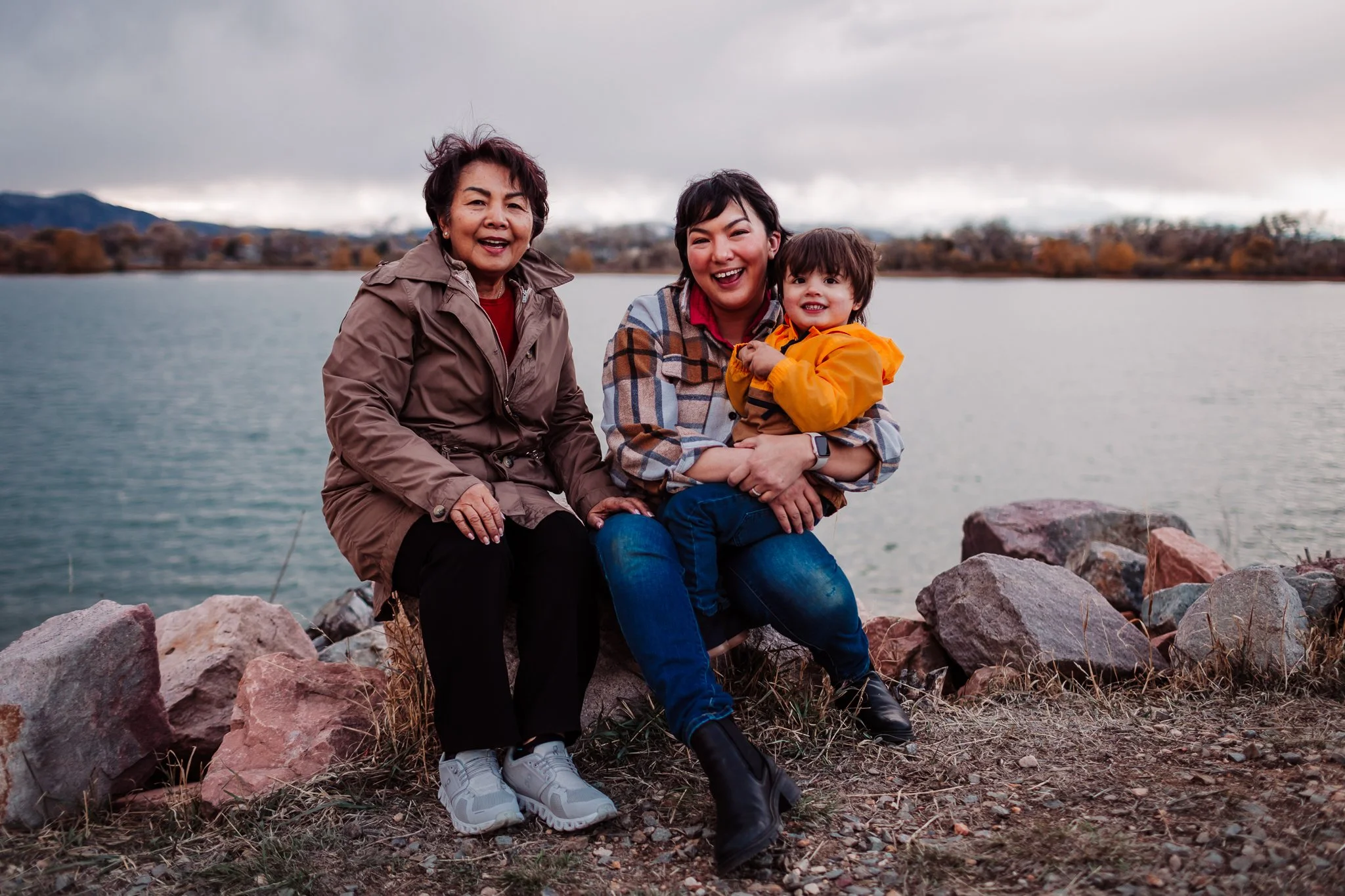 Extended family standing together at Waneka Lake in Lafayette, Colorado during a Thanksgiving lifestyle session
