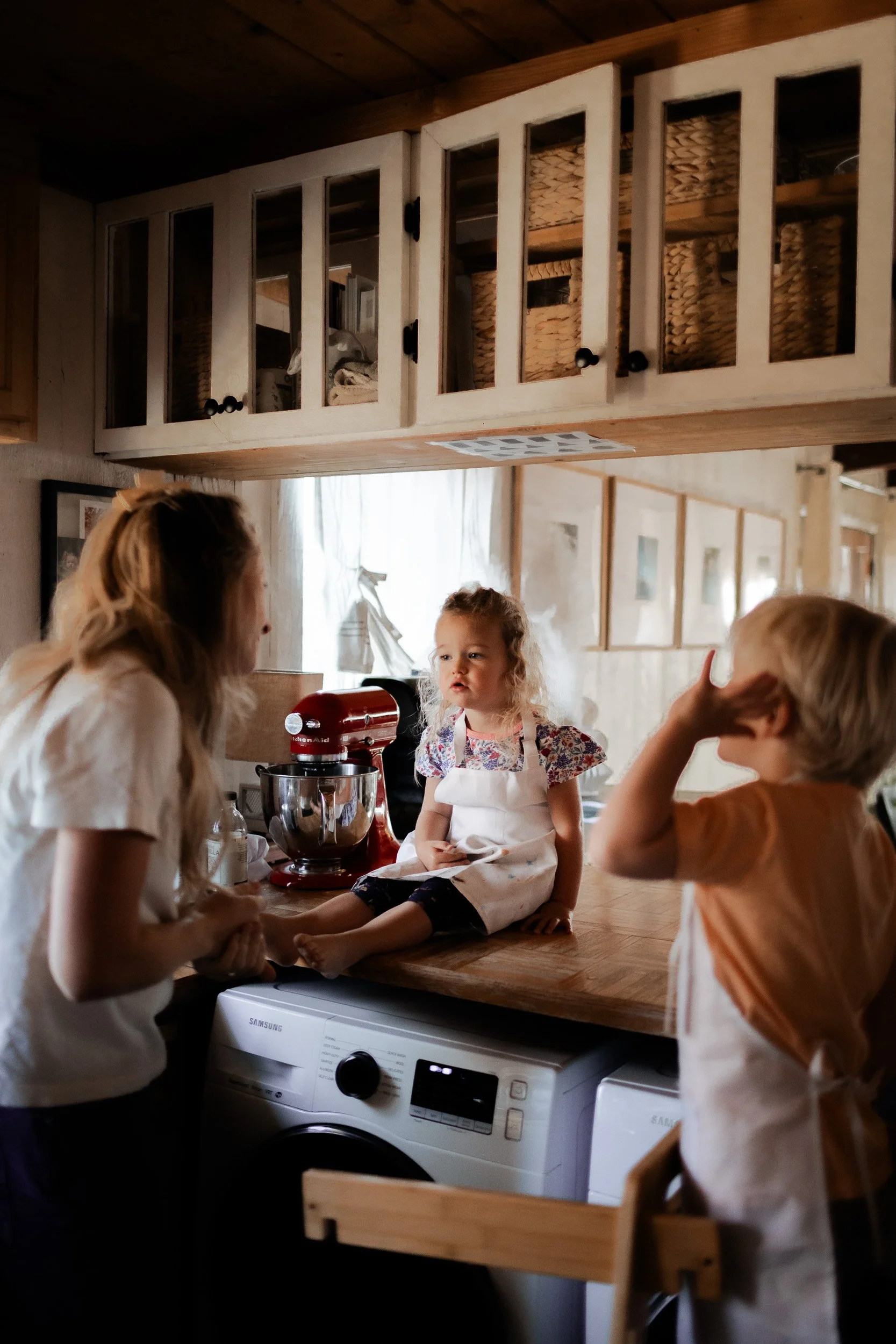 Lifestyle family portrait in Boulder, Colorado showing parents and children spending time together at home