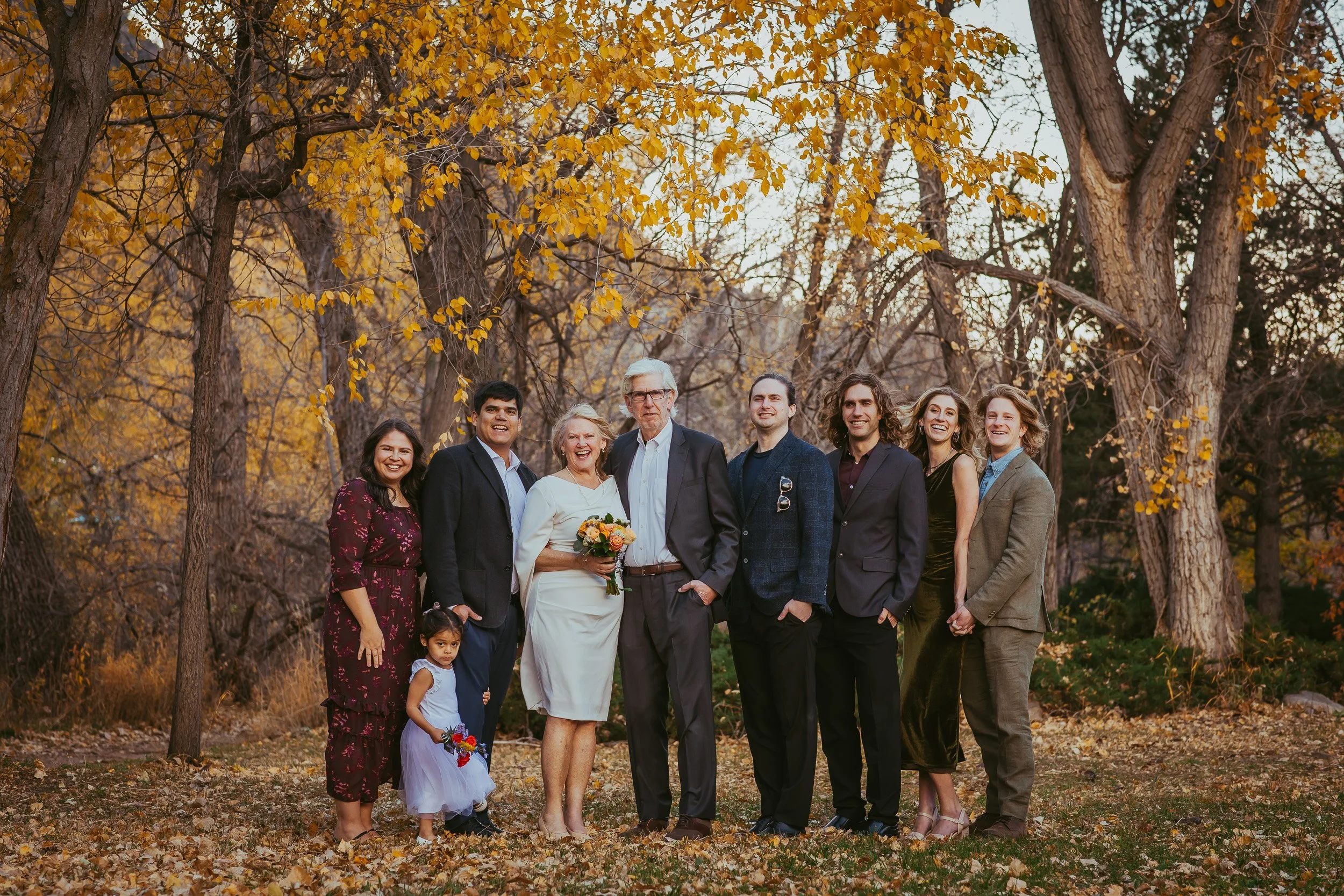 Laurie and Mark standing with their children outside the Boulder Municipal Court before their courthouse wedding