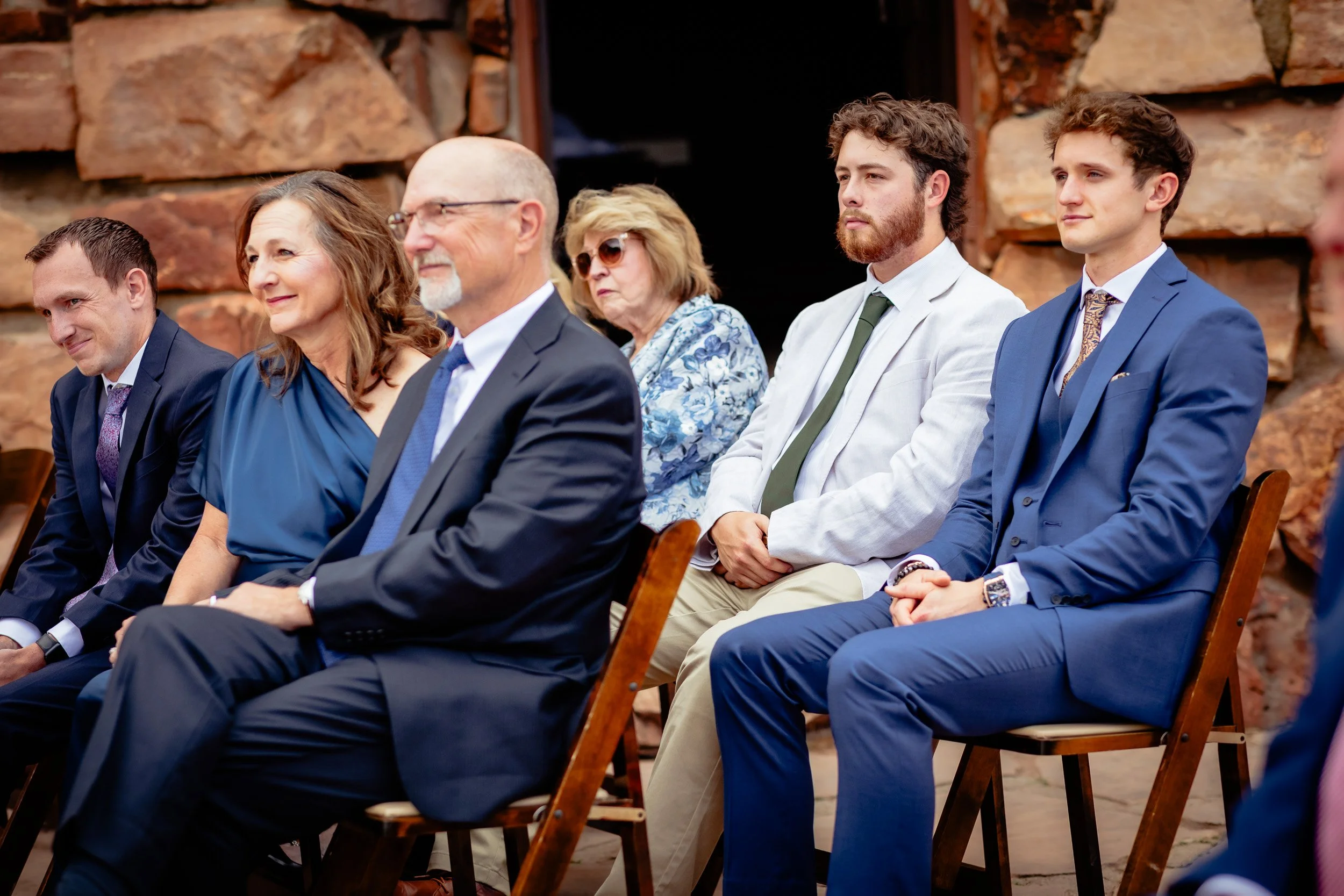 Guests watching an intimate wedding ceremony along Flagstaff Road in Boulder
