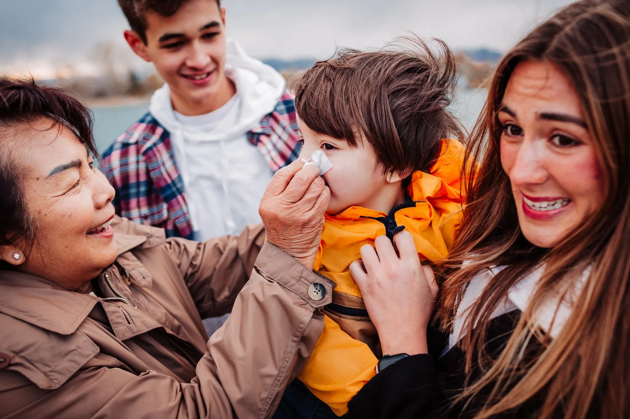 Extended family standing together at Waneka Lake in Lafayette, Colorado during a Thanksgiving lifestyle session