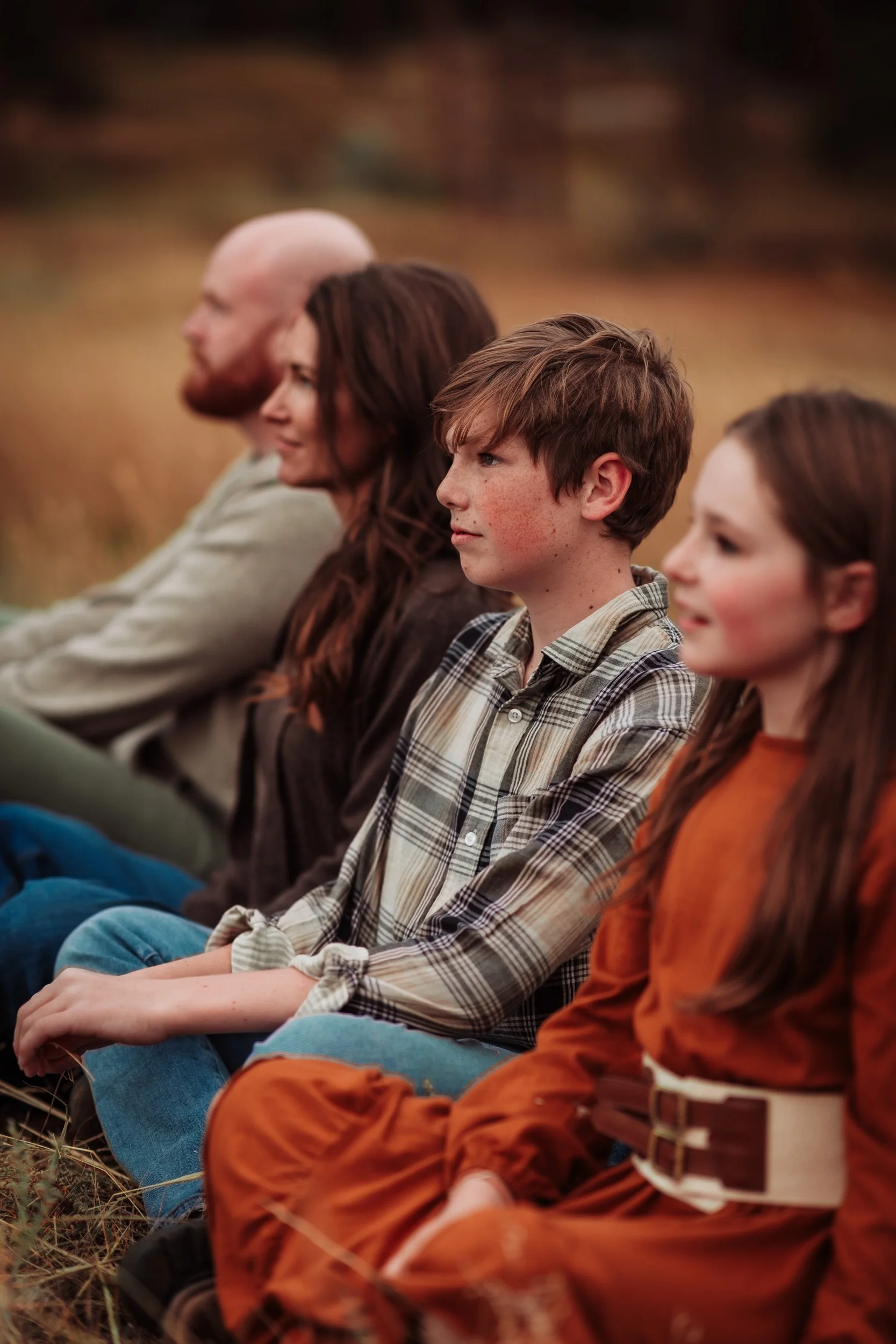 Family of four enjoying an easy-going photo session in Boulder, Colorado in fall