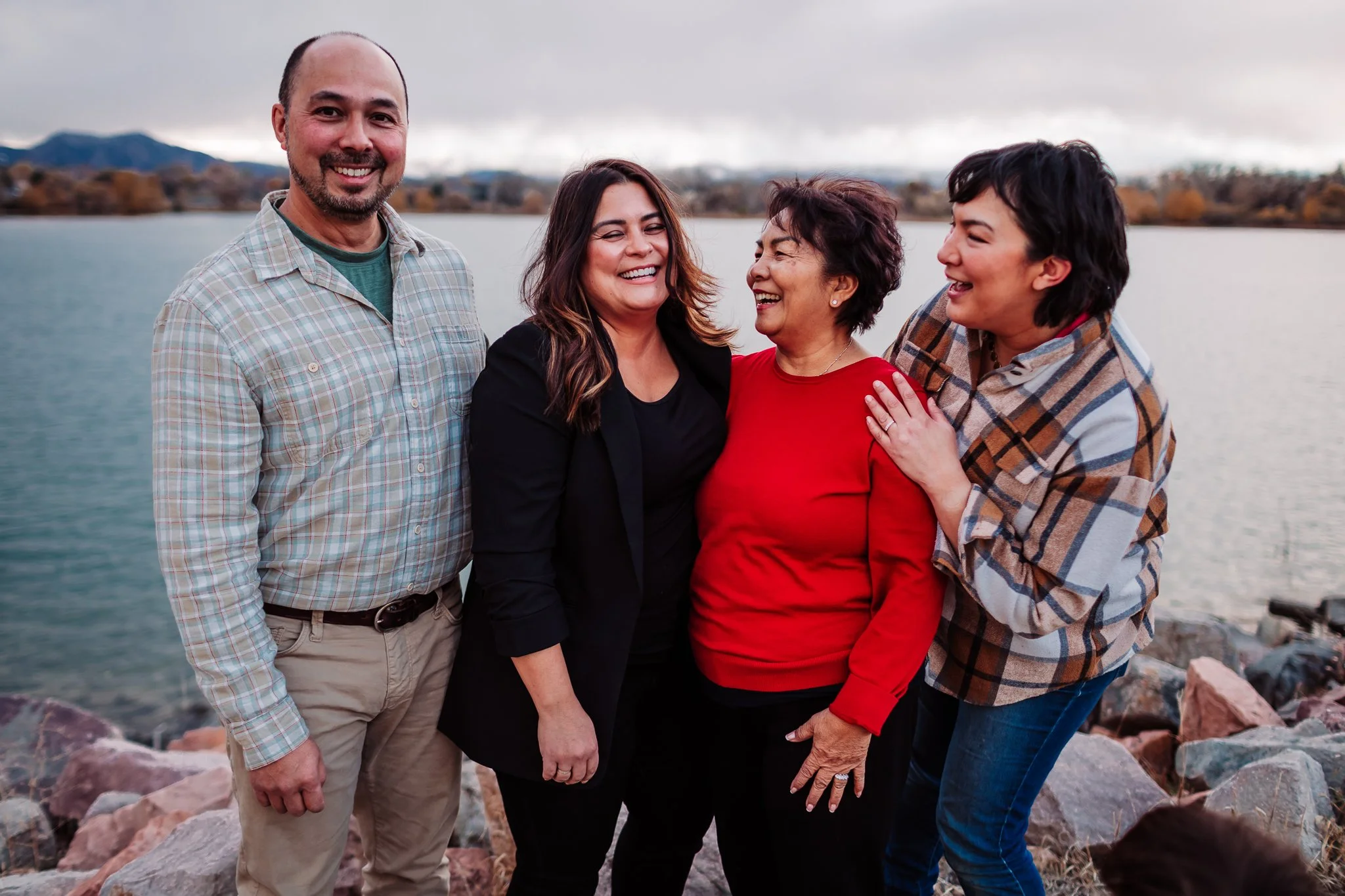 Extended family standing together at Waneka Lake in Lafayette, Colorado during a Thanksgiving lifestyle session