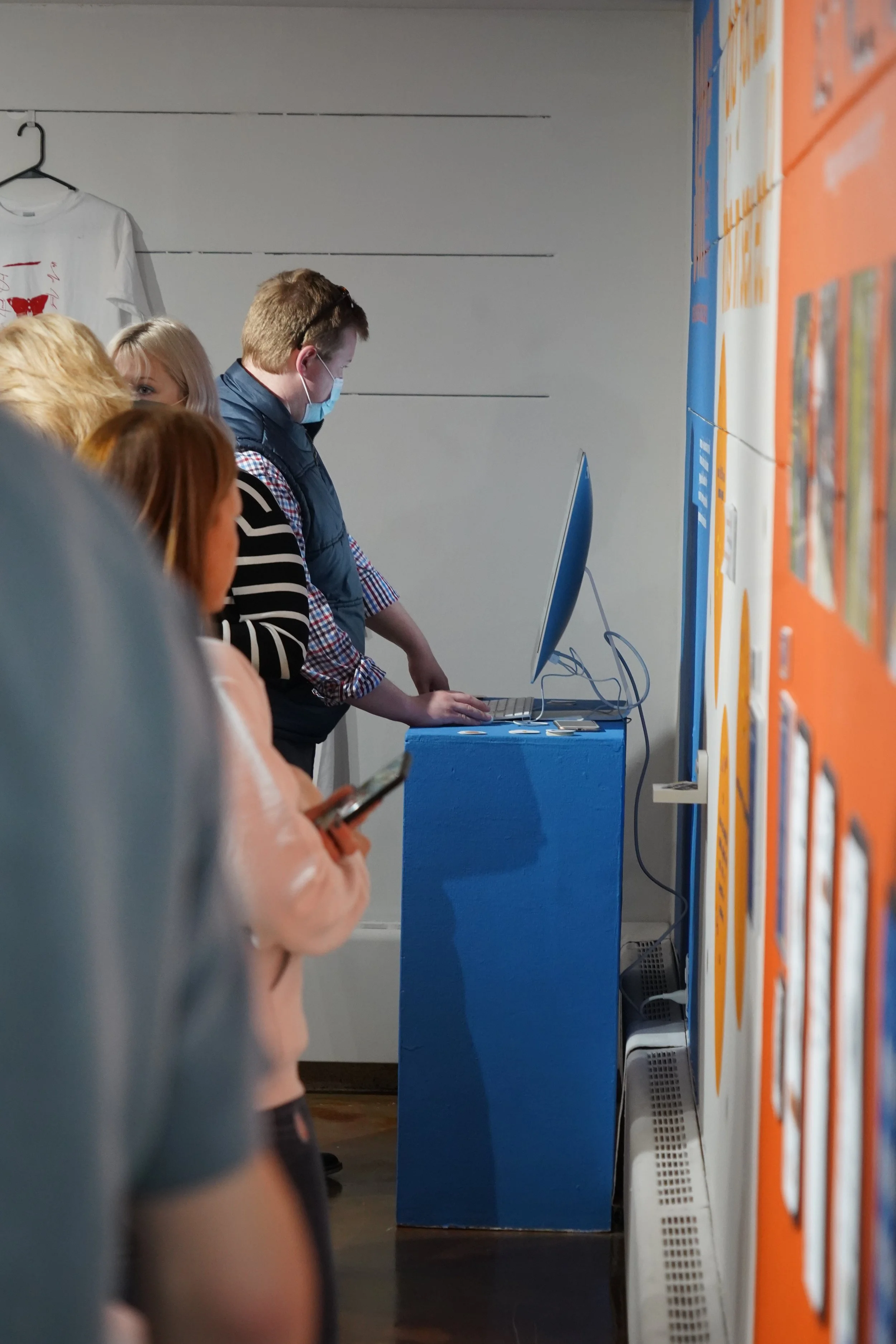 man interacting with the art installation