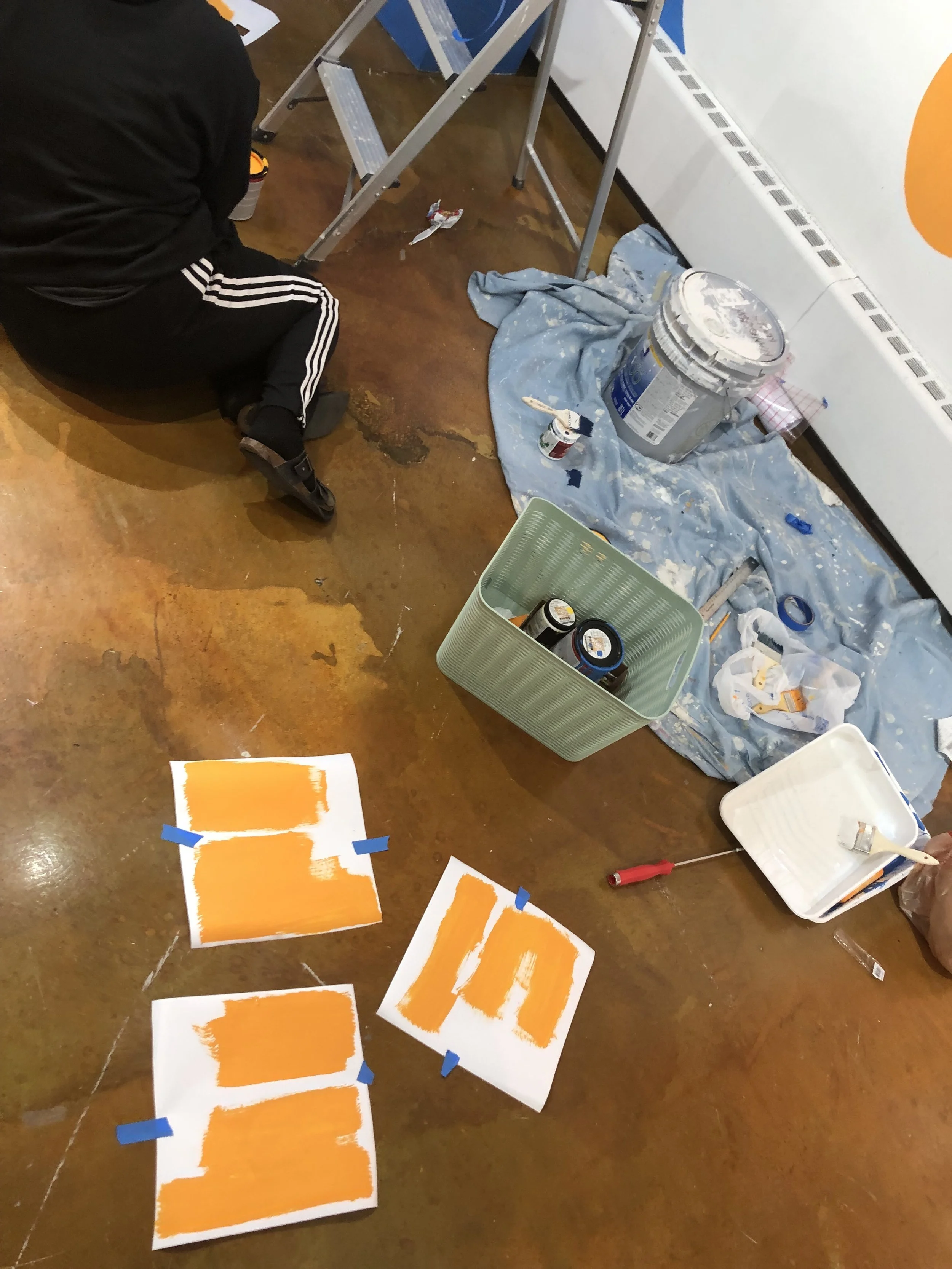 painting tools on the floor