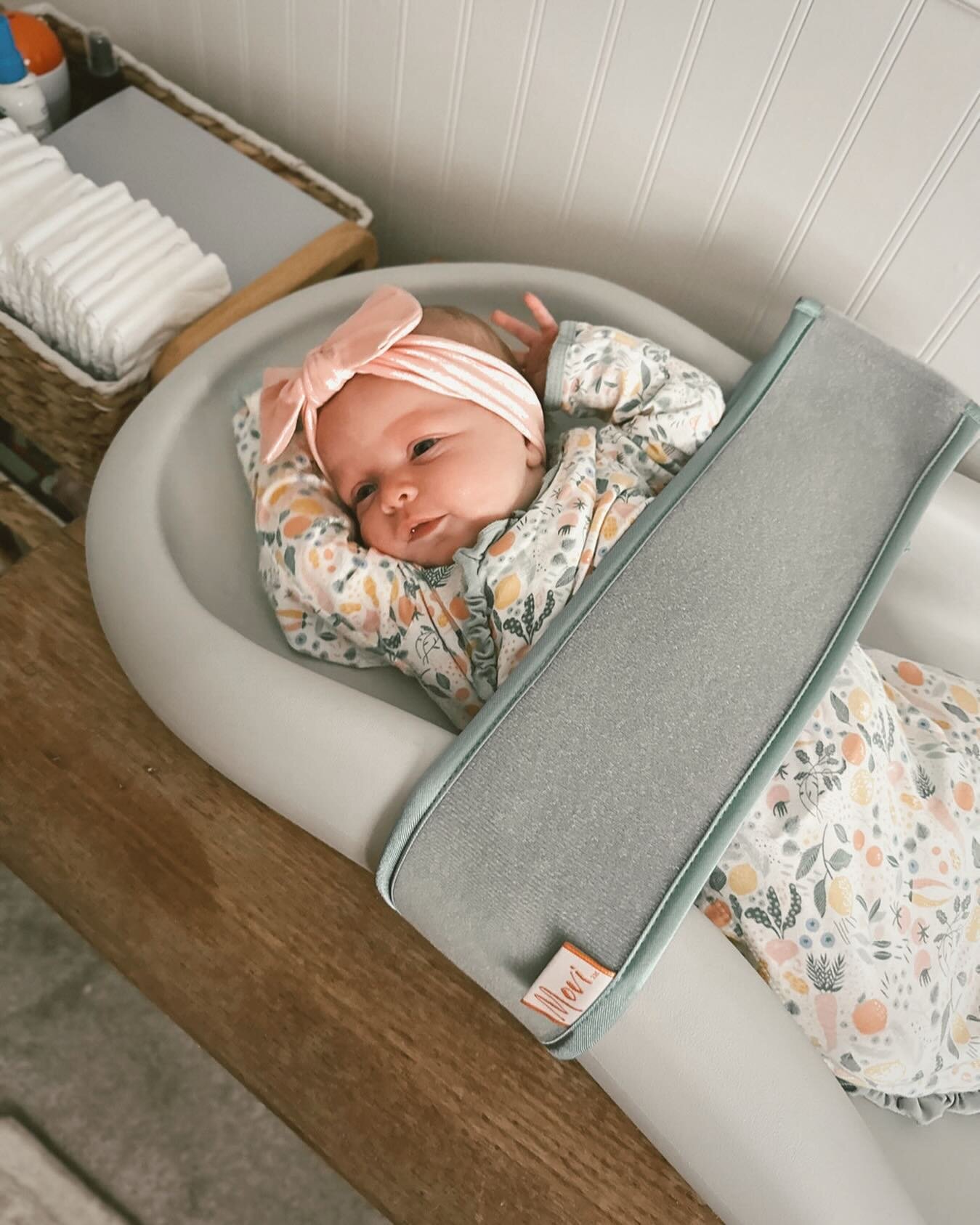 Behind the scenes of working (just a little bit) during maternity leave. We love our @movifamily Cocoon changing pad! Carson did excellent&mdash;mostly all smiles&mdash;during her first work photoshoot. Check out the Movi family IG page for the fun w